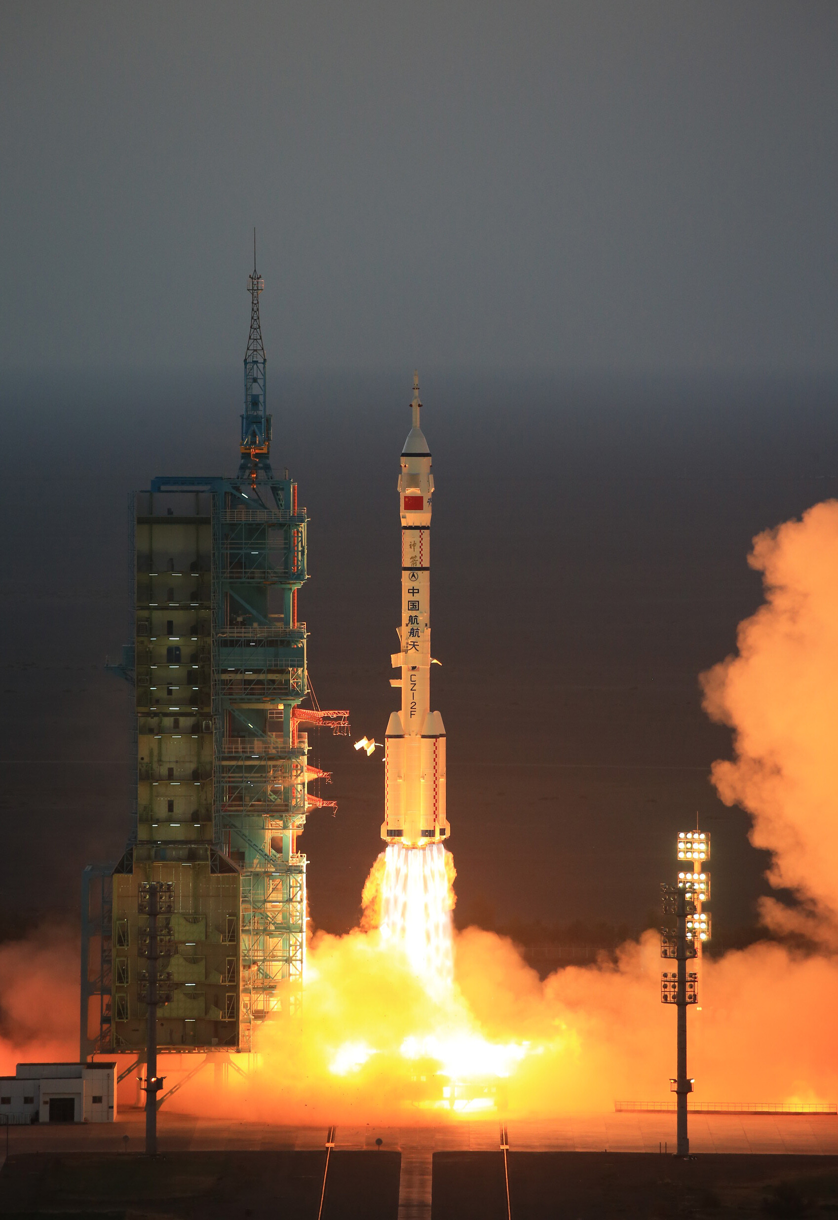 Tiangong Space Station: China's Long March 2F thunders off at Dawn with Two-Man Crew, Spaceflight. 1700x2480 HD Wallpaper.