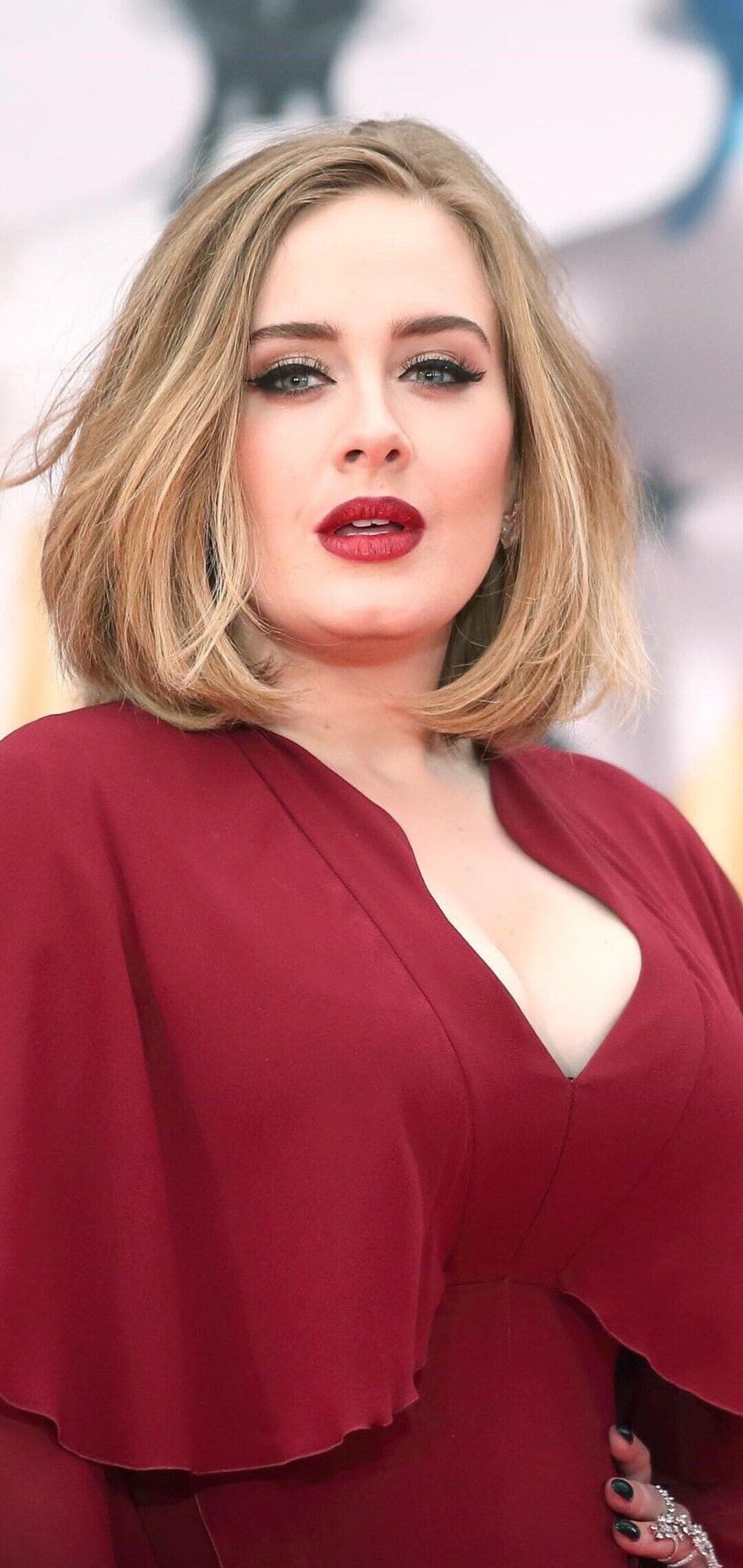Adele: The third studio album, “25,” her second number-one album in the U.K.. 1080x2280 HD Background.