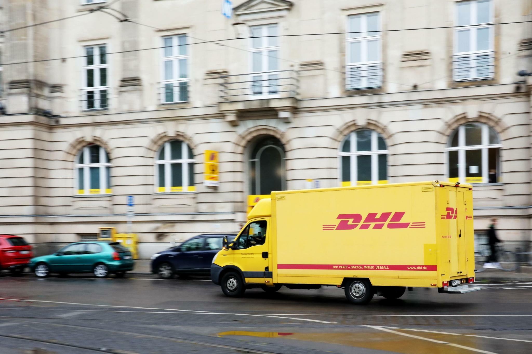 DHL: Part of the world's leading postal and logistics company Deutsche Post DHL Group. 2050x1370 HD Background.