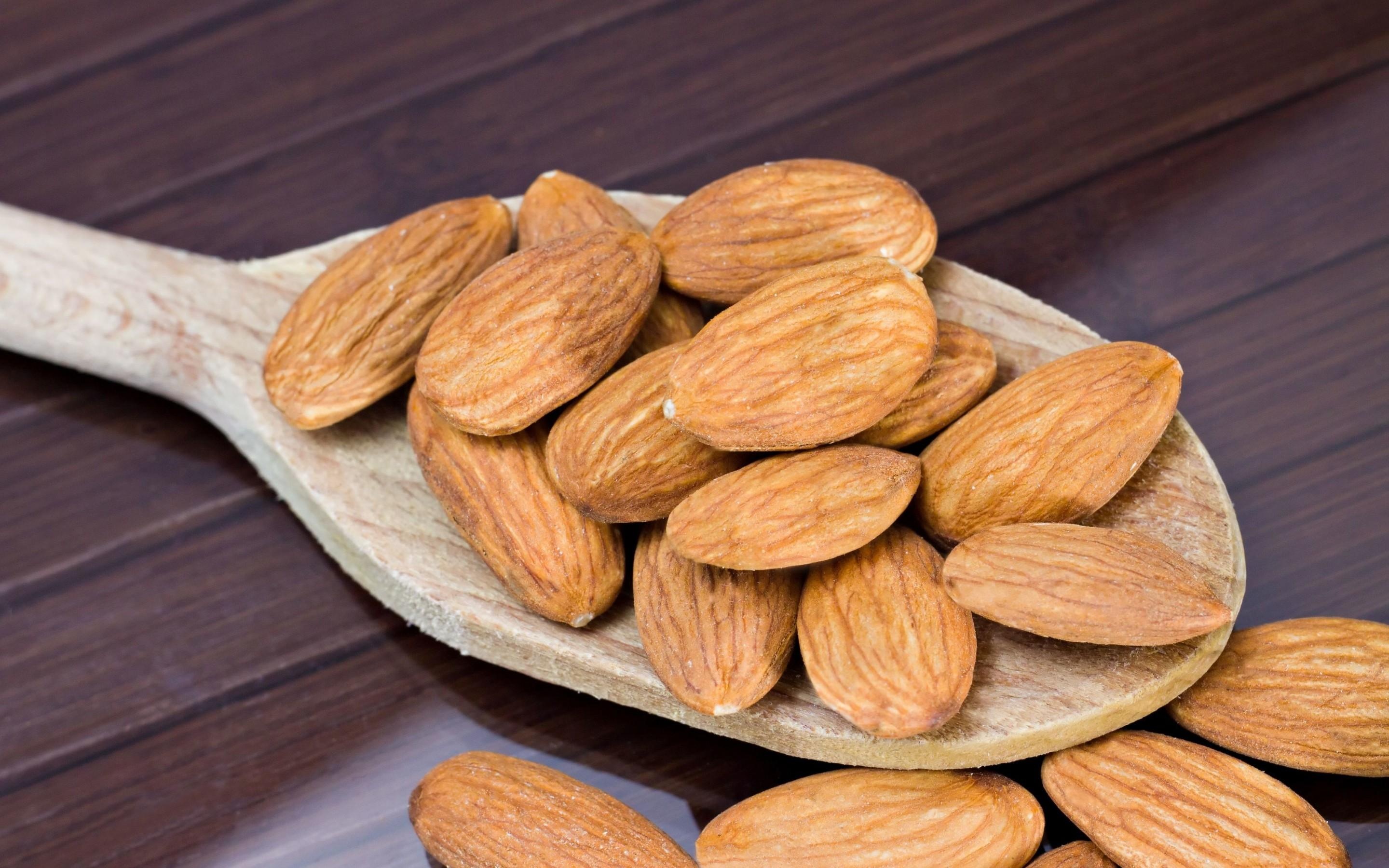 Almonds: Providing a range of essential nutrients, A drupe fruit produced by the almond tree. 2880x1800 HD Wallpaper.