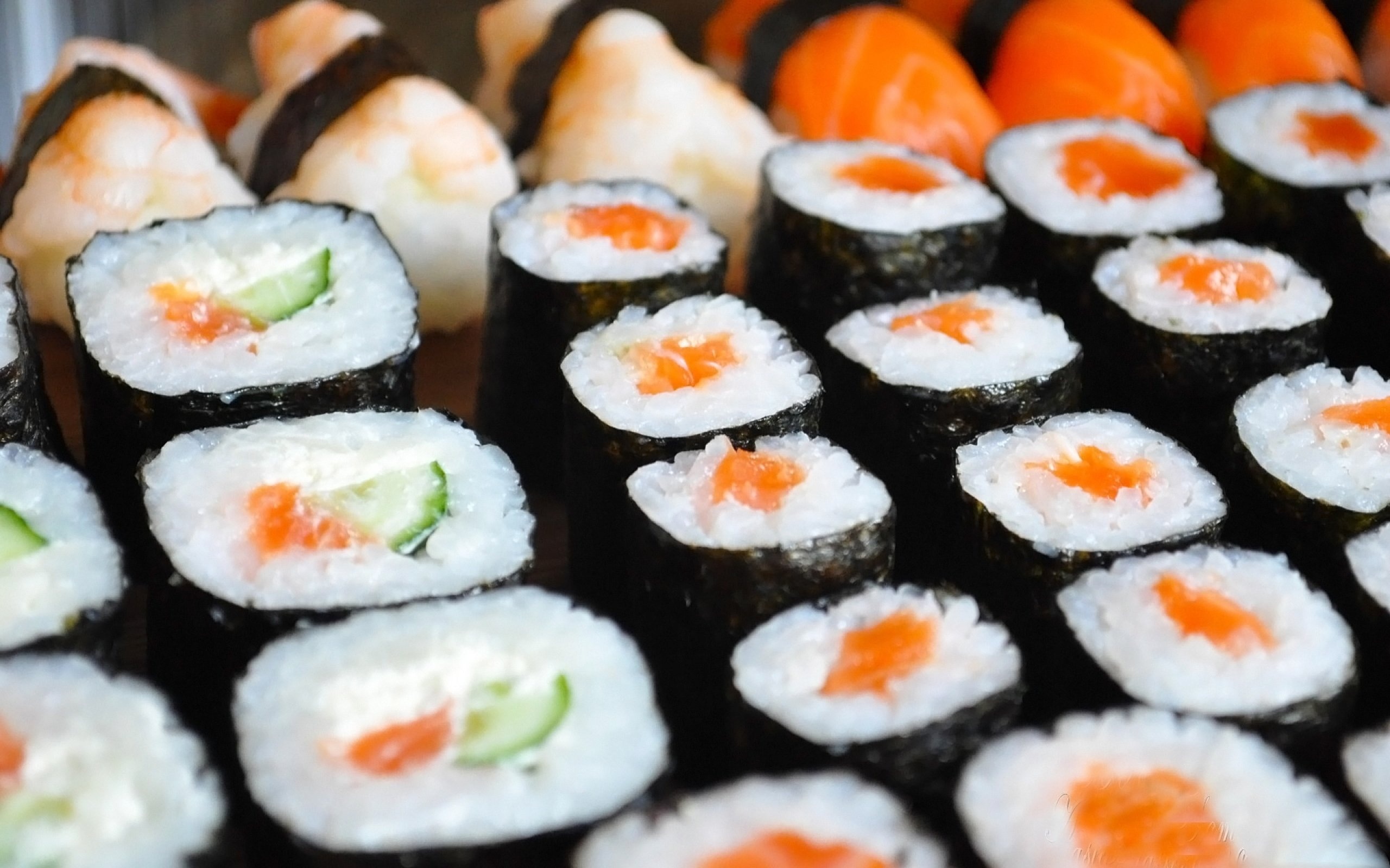 Sushi: A staple rice dish of Japanese cuisine. 2560x1600 HD Background.