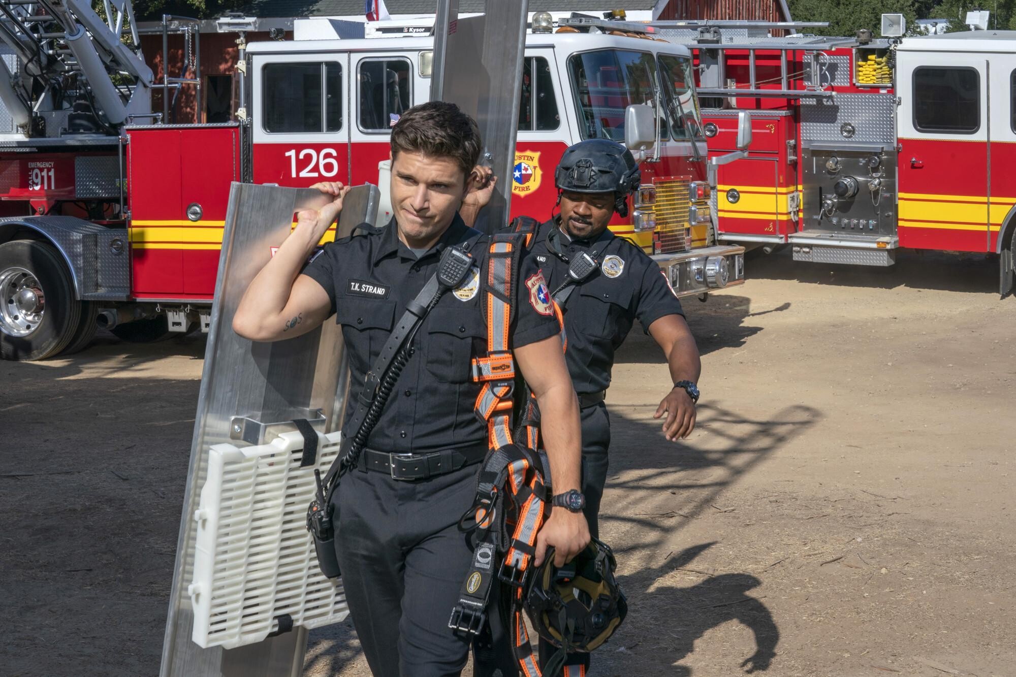 9-1-1: Lone Star (TV Series): Protective Fire Shields, Fireproof Gear, Fire Truck, Tyler Strand And Paul Strickland, Texas Proud. 2000x1340 HD Background.