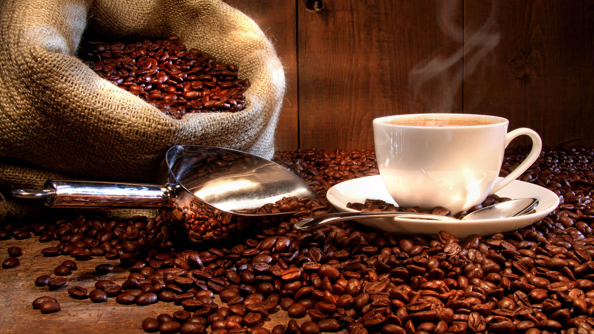 Coffee: Dried and roasted seed of a tropical plant, Genus Coffea. 1920x1080 Full HD Background.
