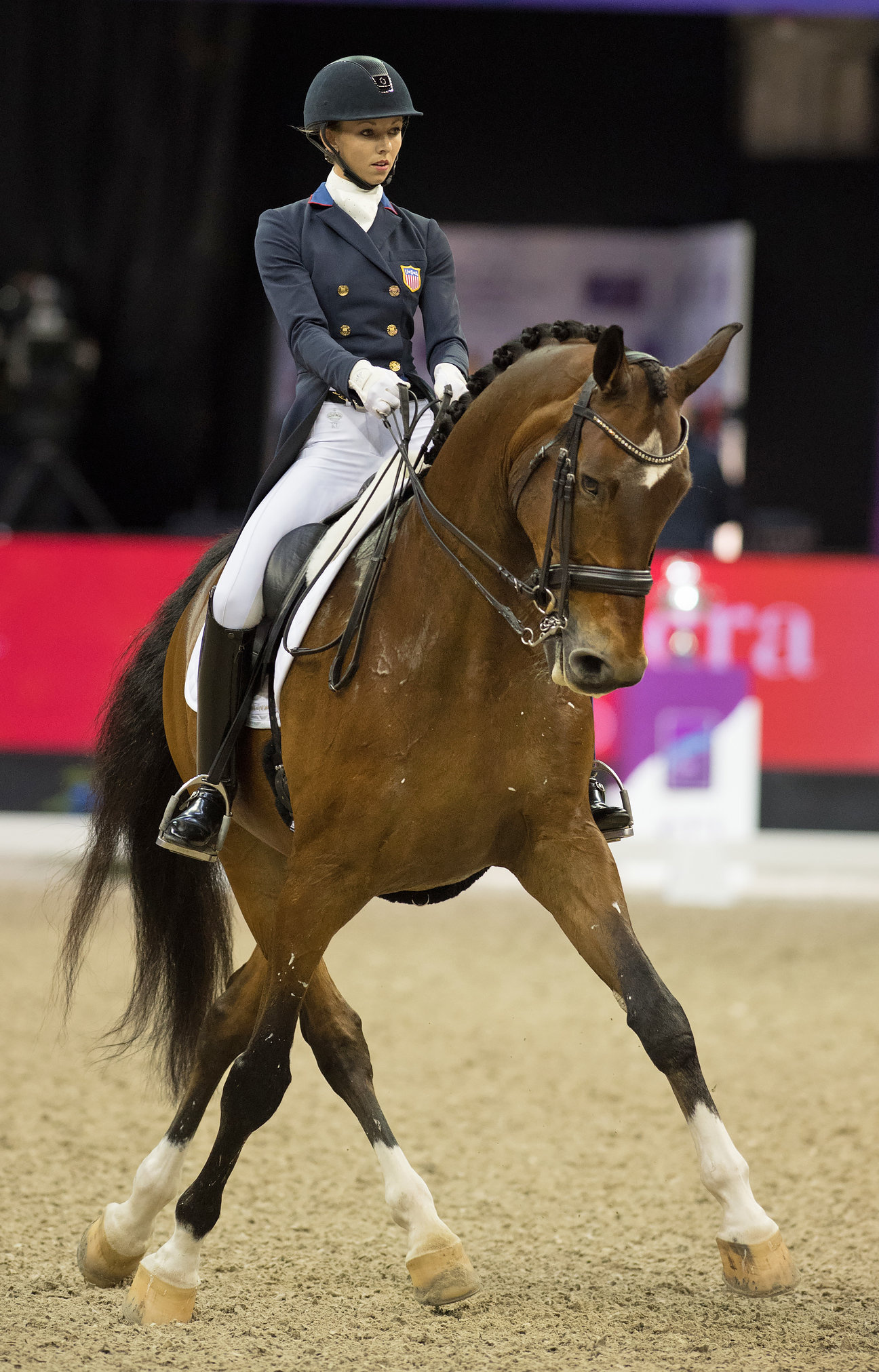 Dressage: Laura Graves and Verdades are showing fancy footwork in the Grand Prix, the World Equestrian Games, France. 1300x2030 HD Background.