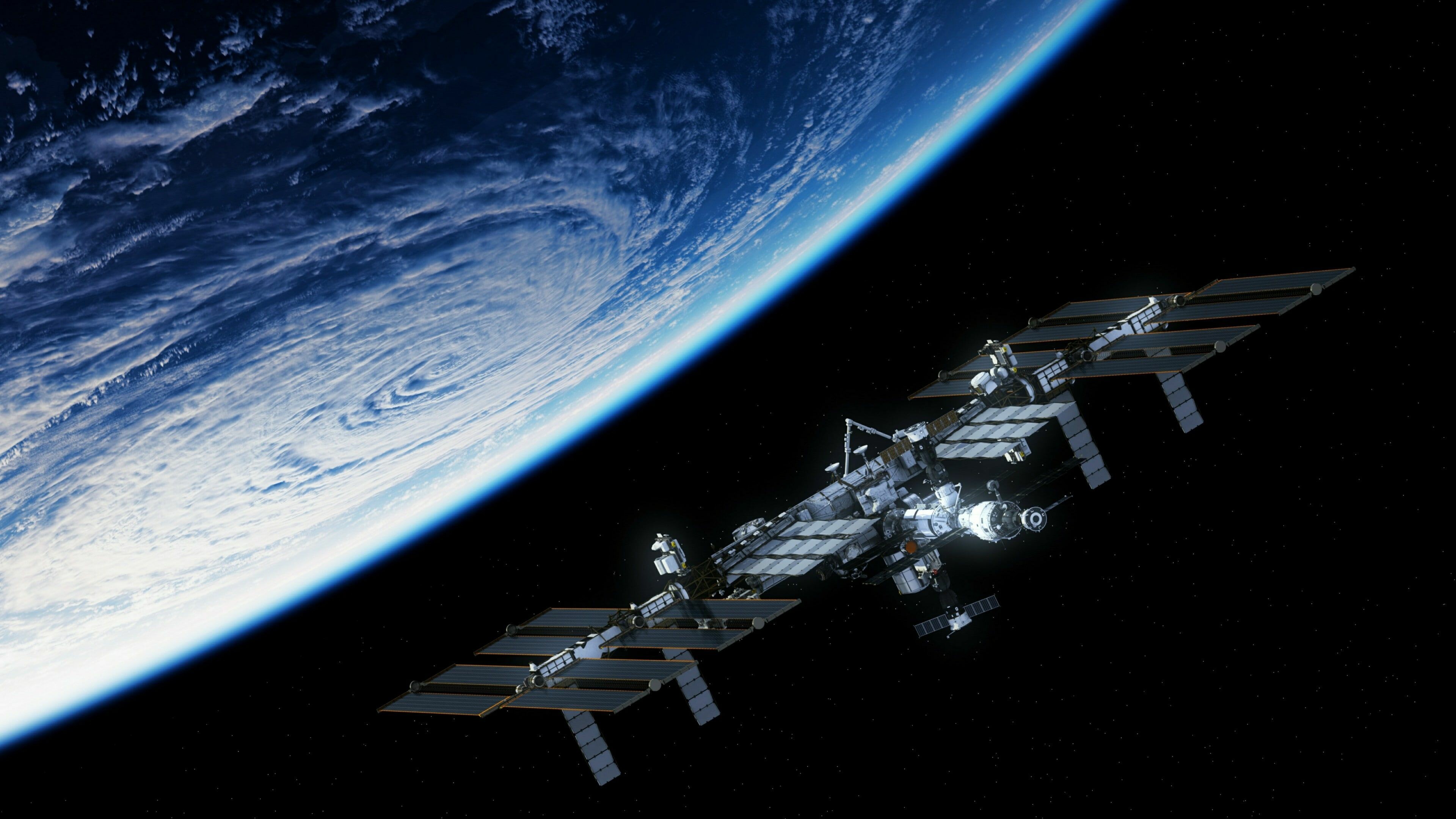 Space Station: ISS, the largest modular artificial satellite in low Earth orbit. 3840x2160 4K Background.