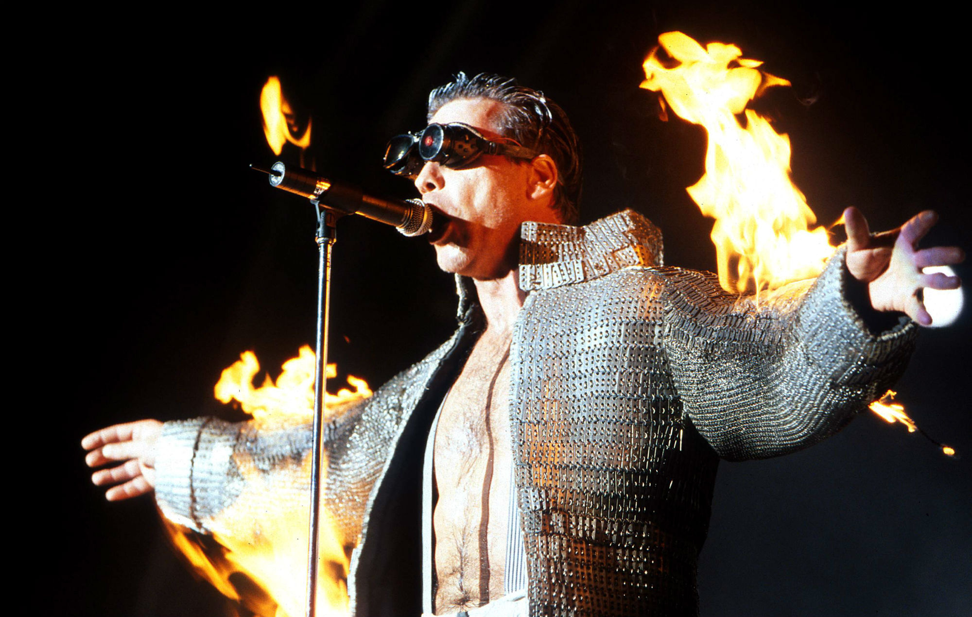 Rammstein: Lindemann, A licensed pyrotechnician, Spends entire songs engulfed in flames. 2000x1270 HD Wallpaper.
