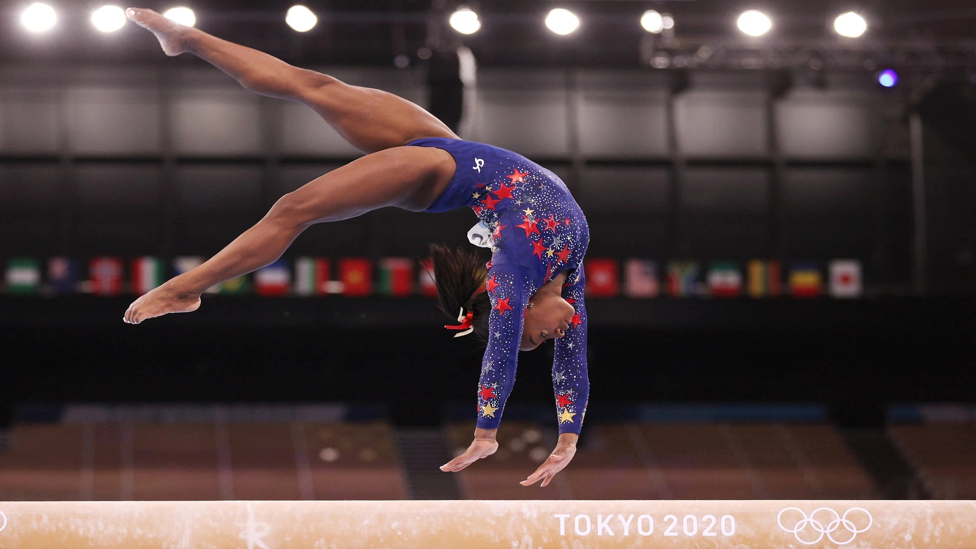 Balance Beam: Simone Biles, The 2020 Tokyo Summer Olympics individual bronze and team silver medalist. 1920x1080 Full HD Wallpaper.