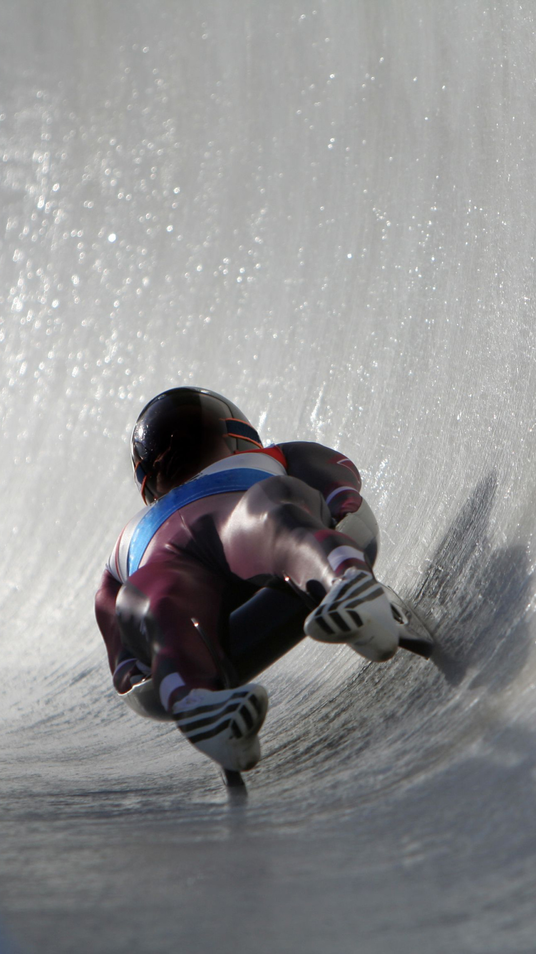 Luge: An official Winter Olympics sports discipline, Extreme bobsled sport. 1080x1920 Full HD Background.