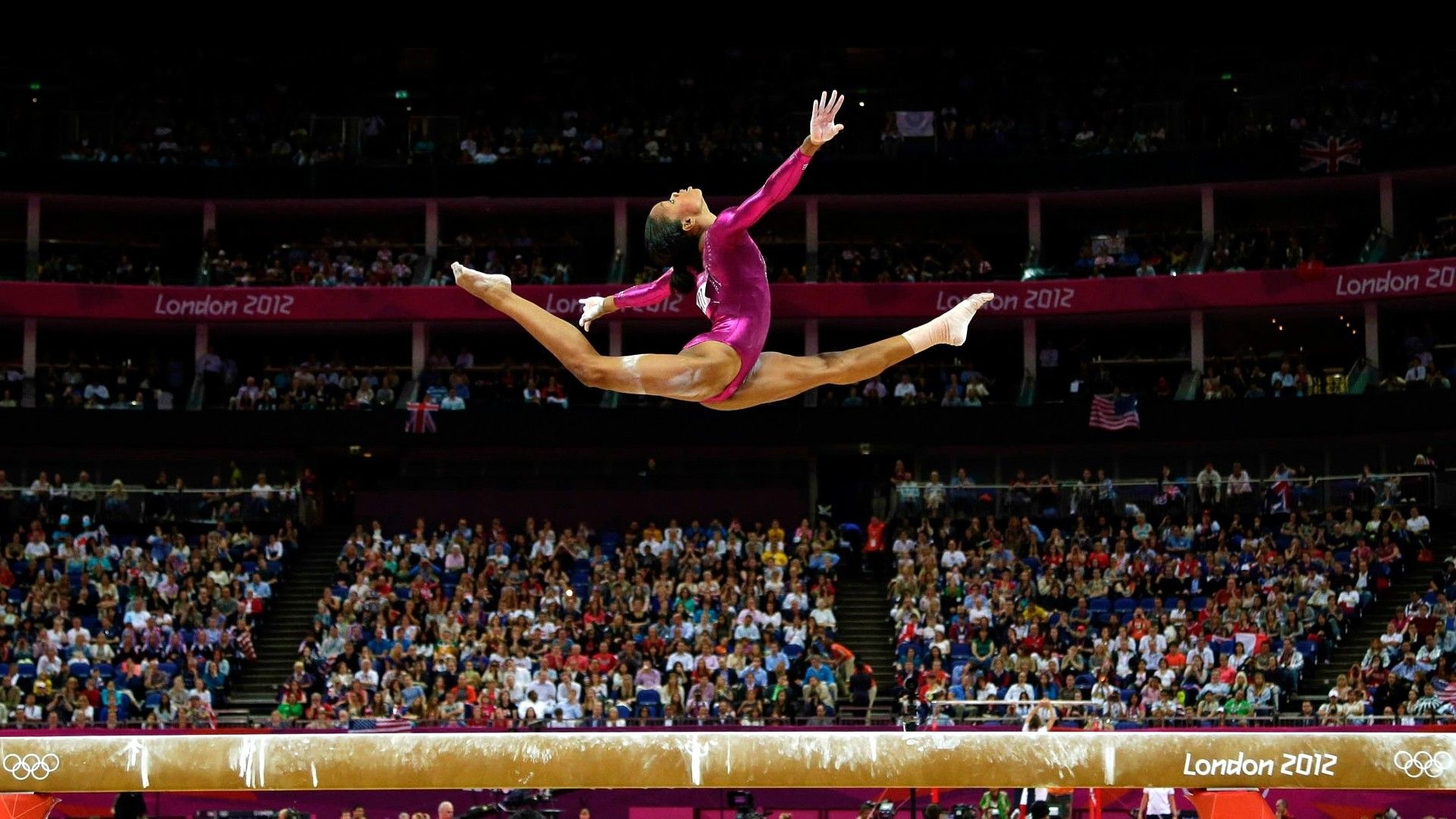 Acrobatic Gymnastics: Gabby Douglas, The 2012 Olympic all-around champion and the 2015 World all-around silver medalist. 1920x1080 Full HD Background.
