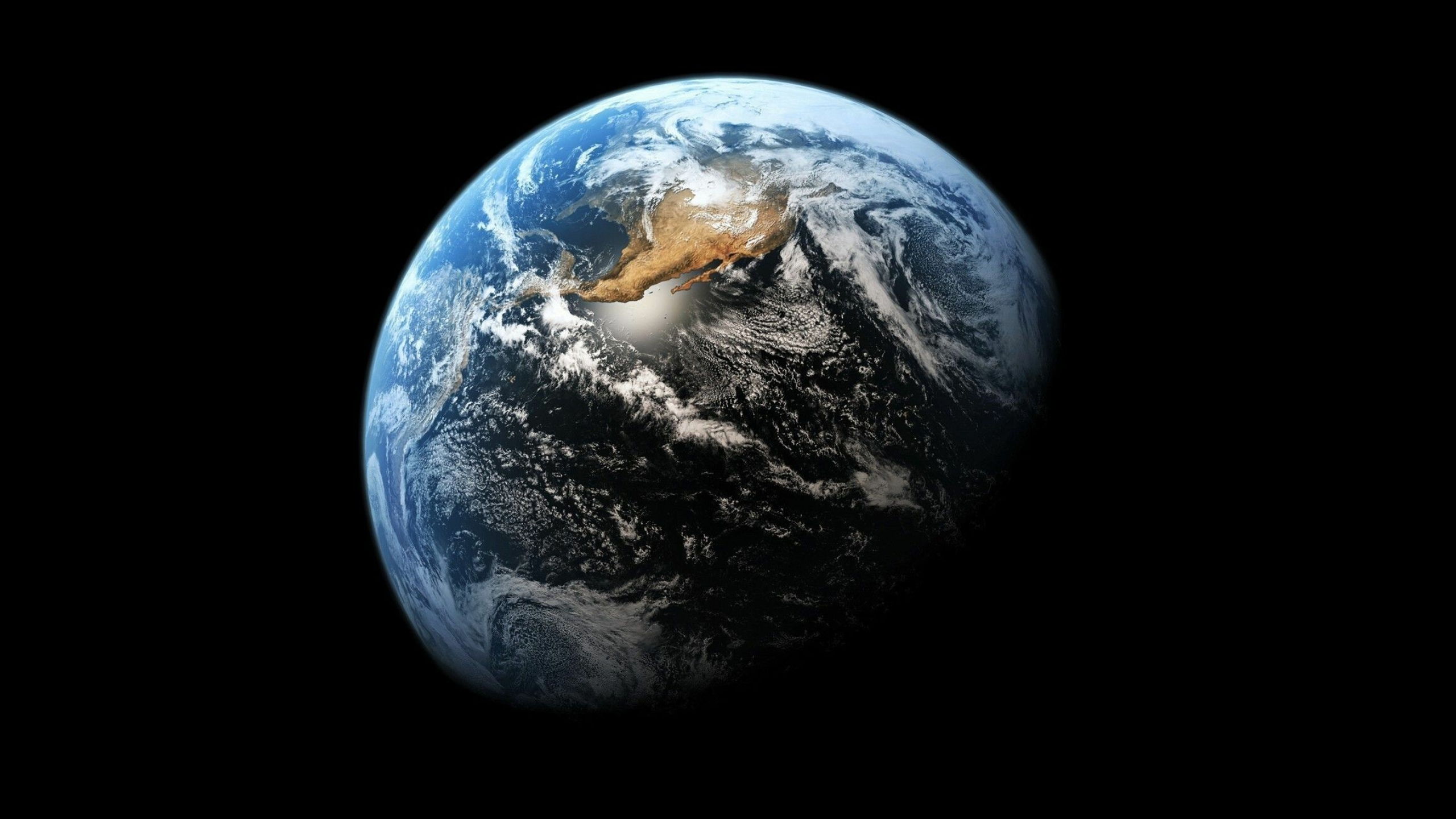 Earth: Humans depend on the planet's biosphere and natural resources for their survival. 2560x1440 HD Background.
