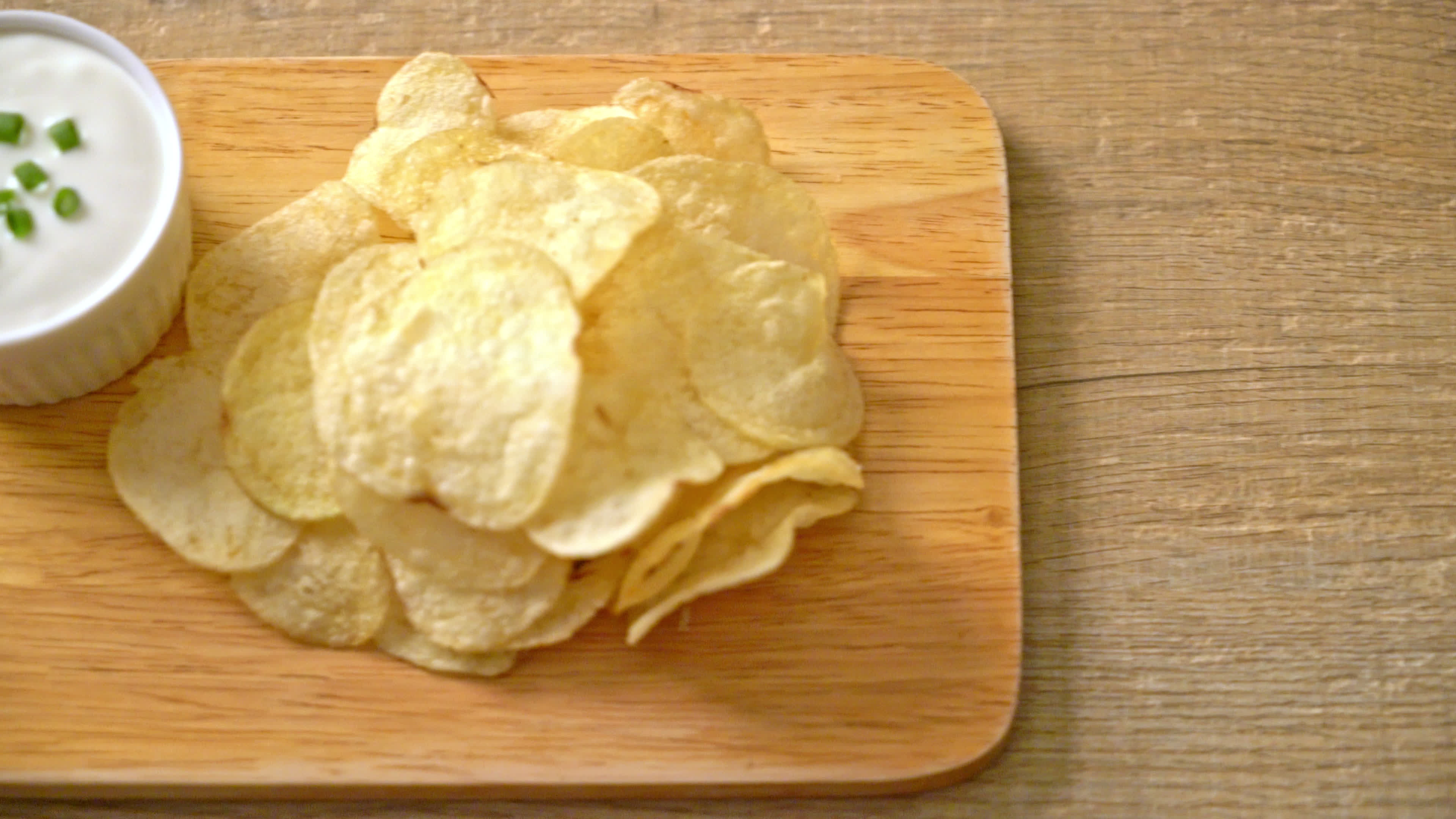 Potato chips with dipping sauce, Irresistible snack, Stock video footage, Craving satisfaction, 3840x2160 4K Desktop
