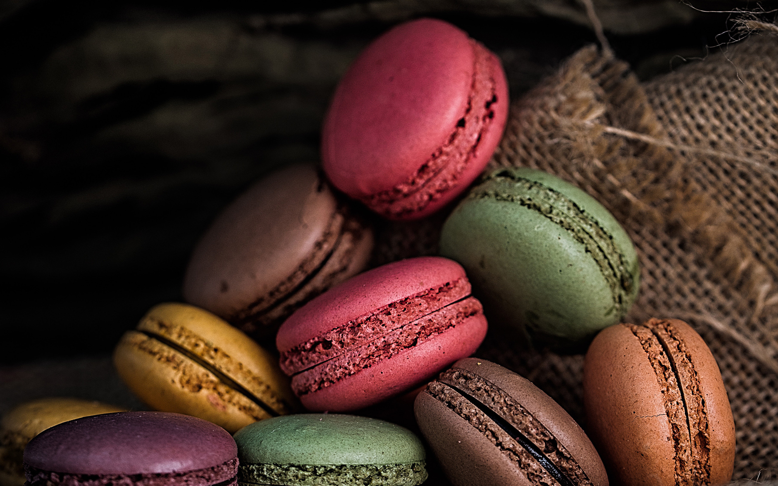Macaron: Colorful cookies, sandwiched together with a ganache, jam or buttercream filling. 2560x1600 HD Background.