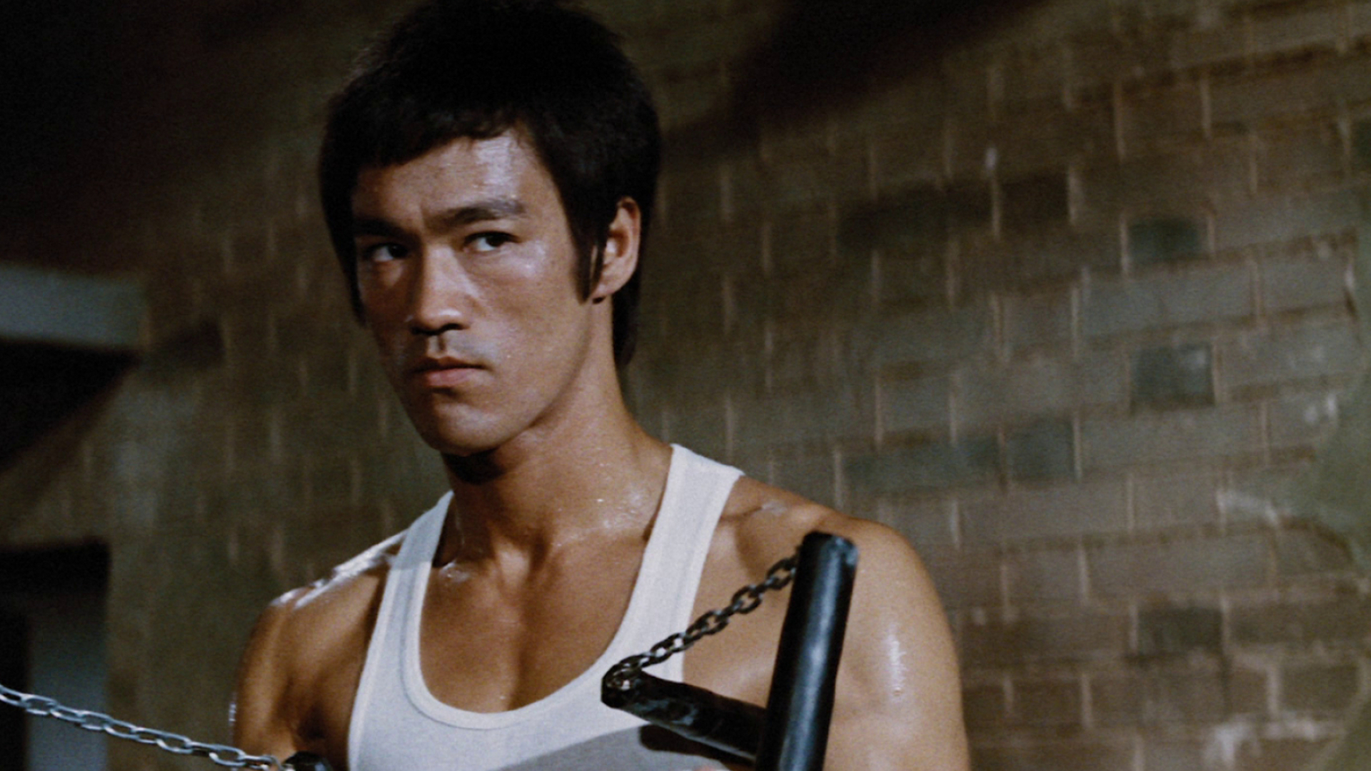 The Way of the Dragon: Bruce Lee as Tang Lung, a young martial artist. 1920x1080 Full HD Wallpaper.