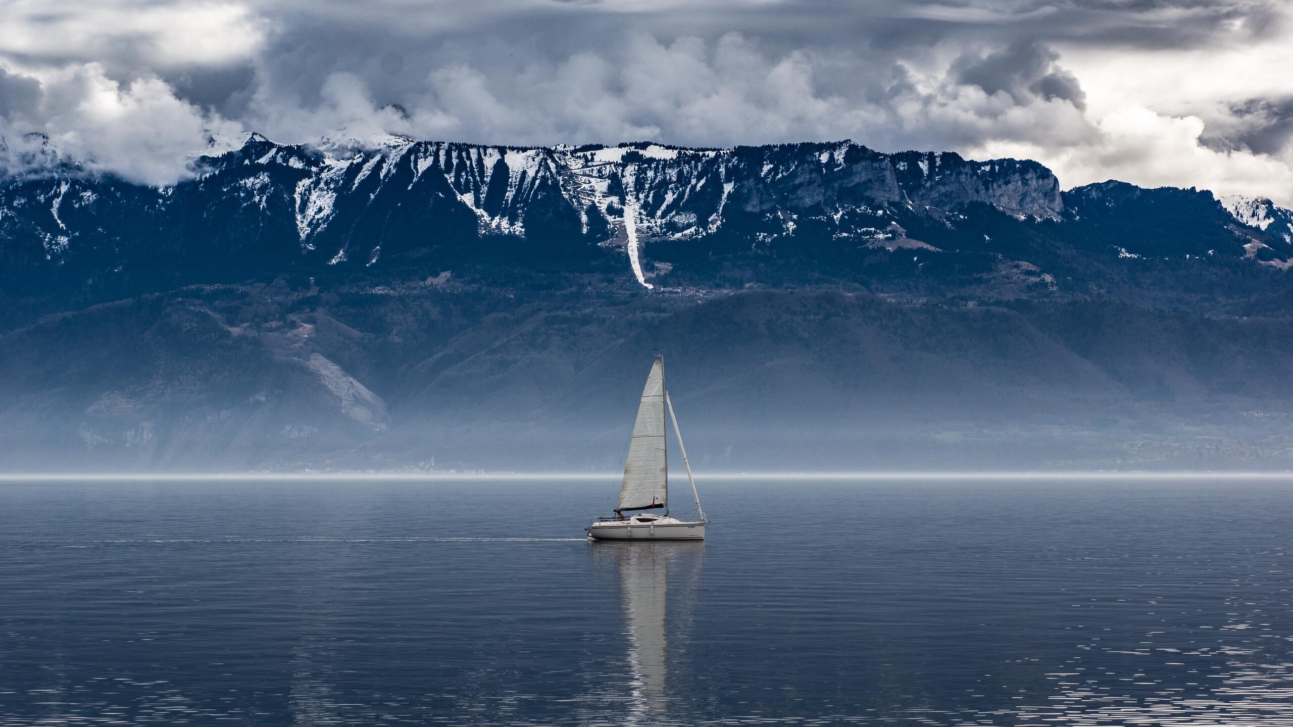 Sail Boat: A watercraft, Seascape, Recreational sailing. 2560x1440 HD Wallpaper.