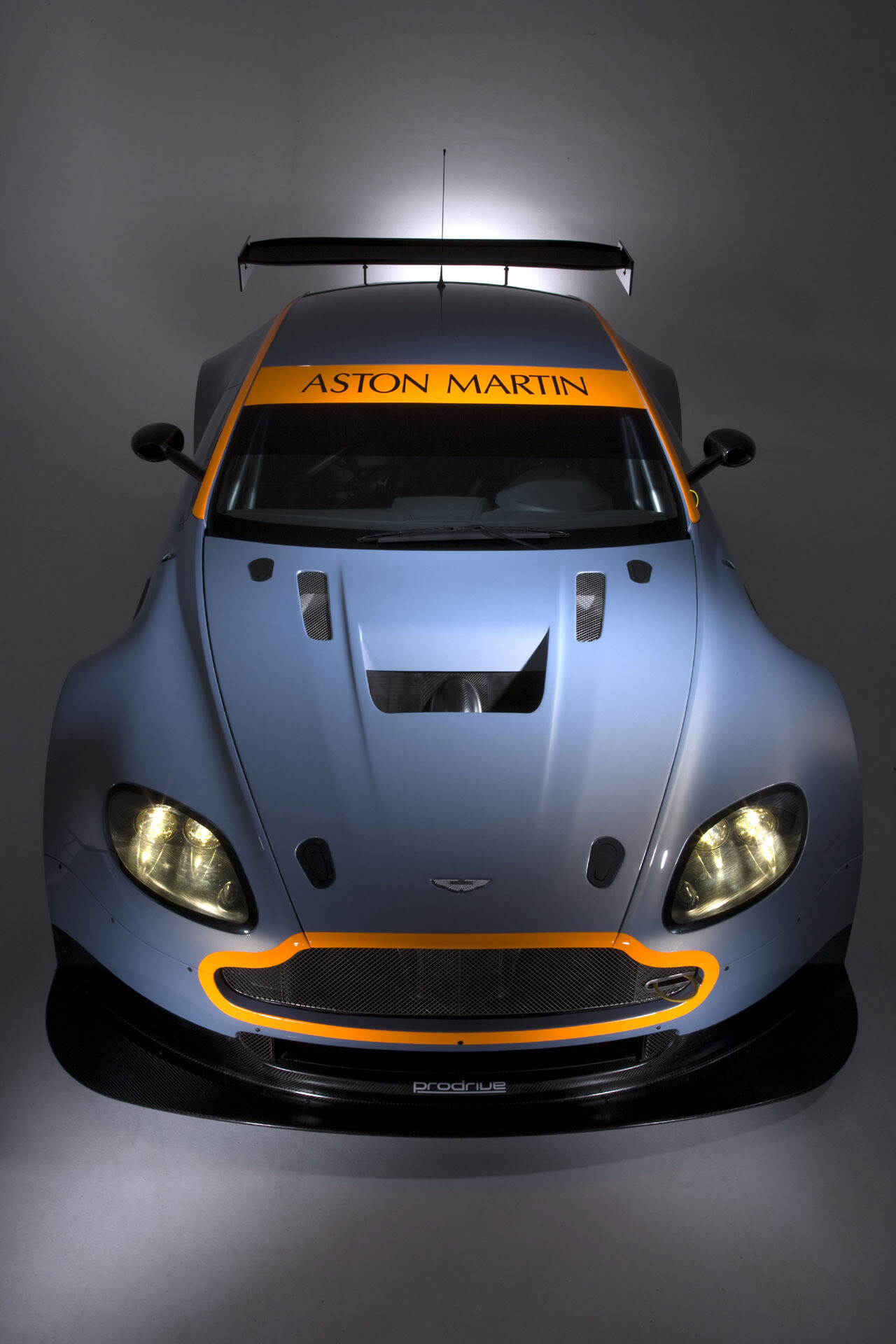 Aston Martin: Featuring as James Bond’s car in many 007 movies over the last 50 years. 1280x1920 HD Background.