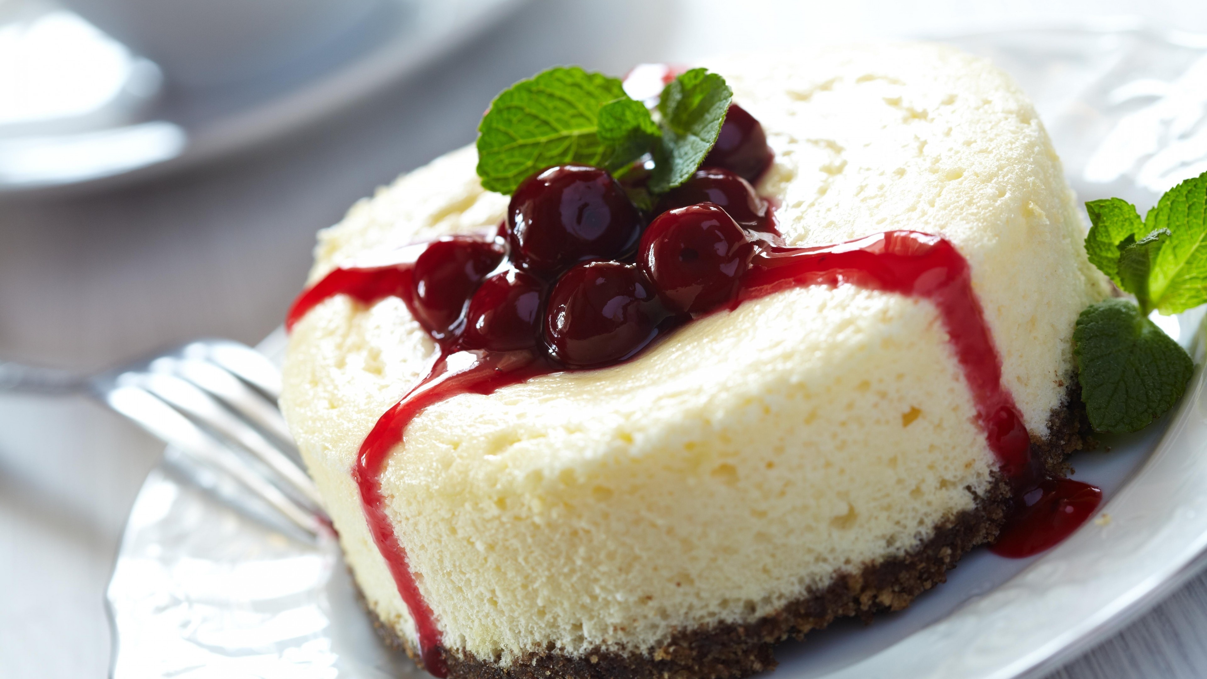 Cheesecake: Essentially rich cheese and egg custard baked over a graham cracker crust. 3840x2160 4K Wallpaper.