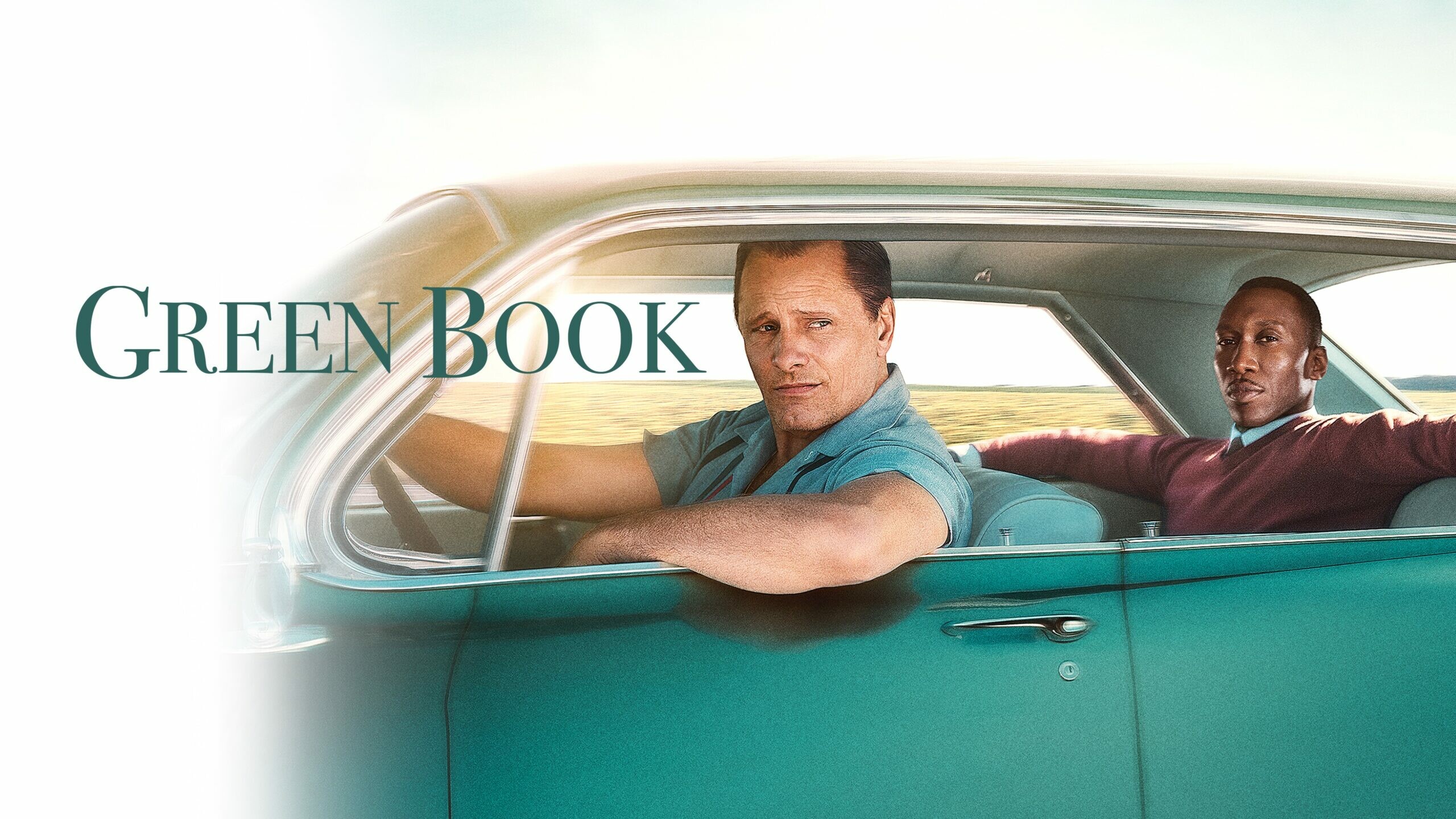 Green Book: A working-class Italian-American bouncer becomes the driver for an African-American classical pianist. 2560x1440 HD Background.