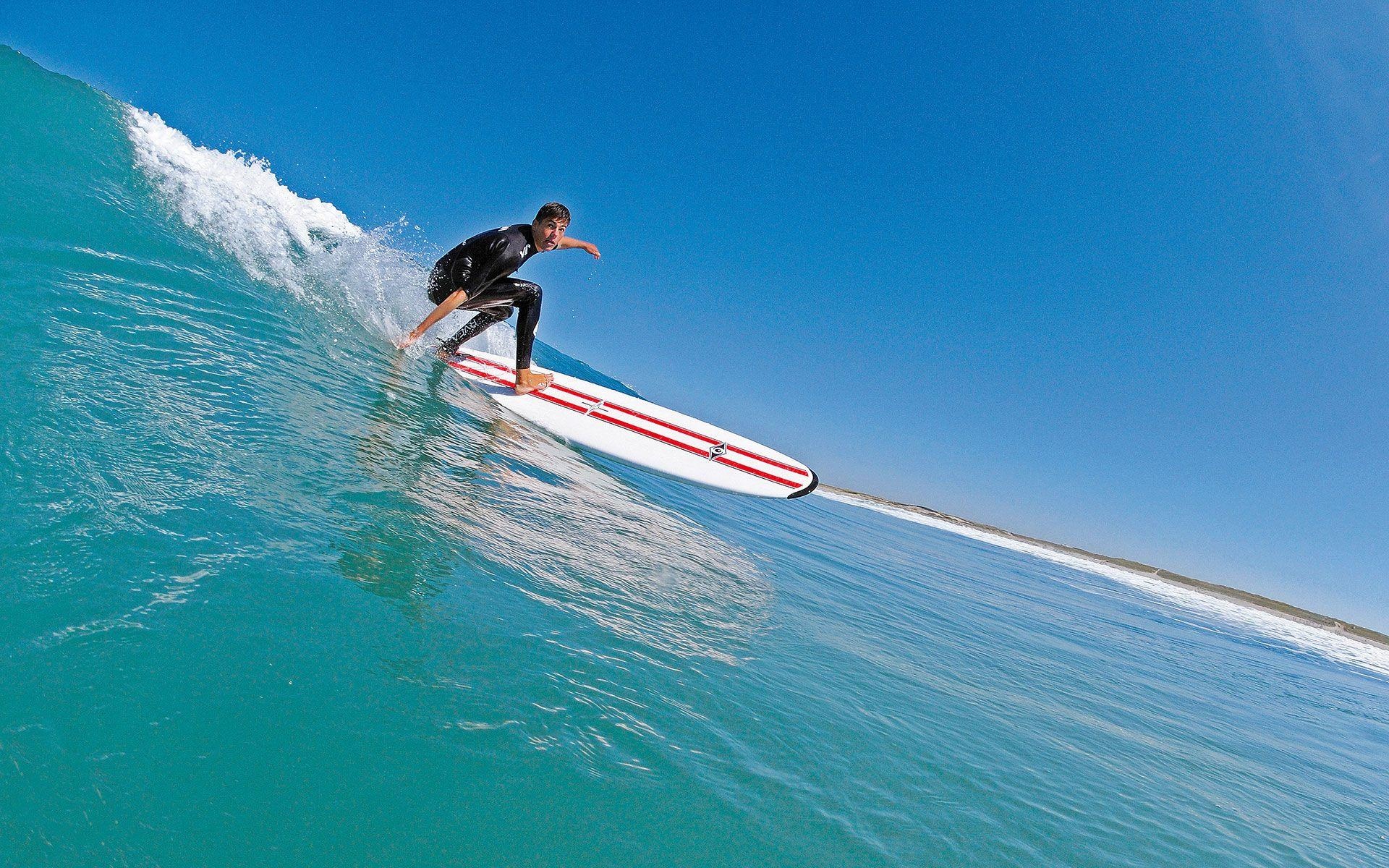 Longboarding surf, Smooth gliding, Sunset views, Stylish maneuvers, 1920x1200 HD Desktop