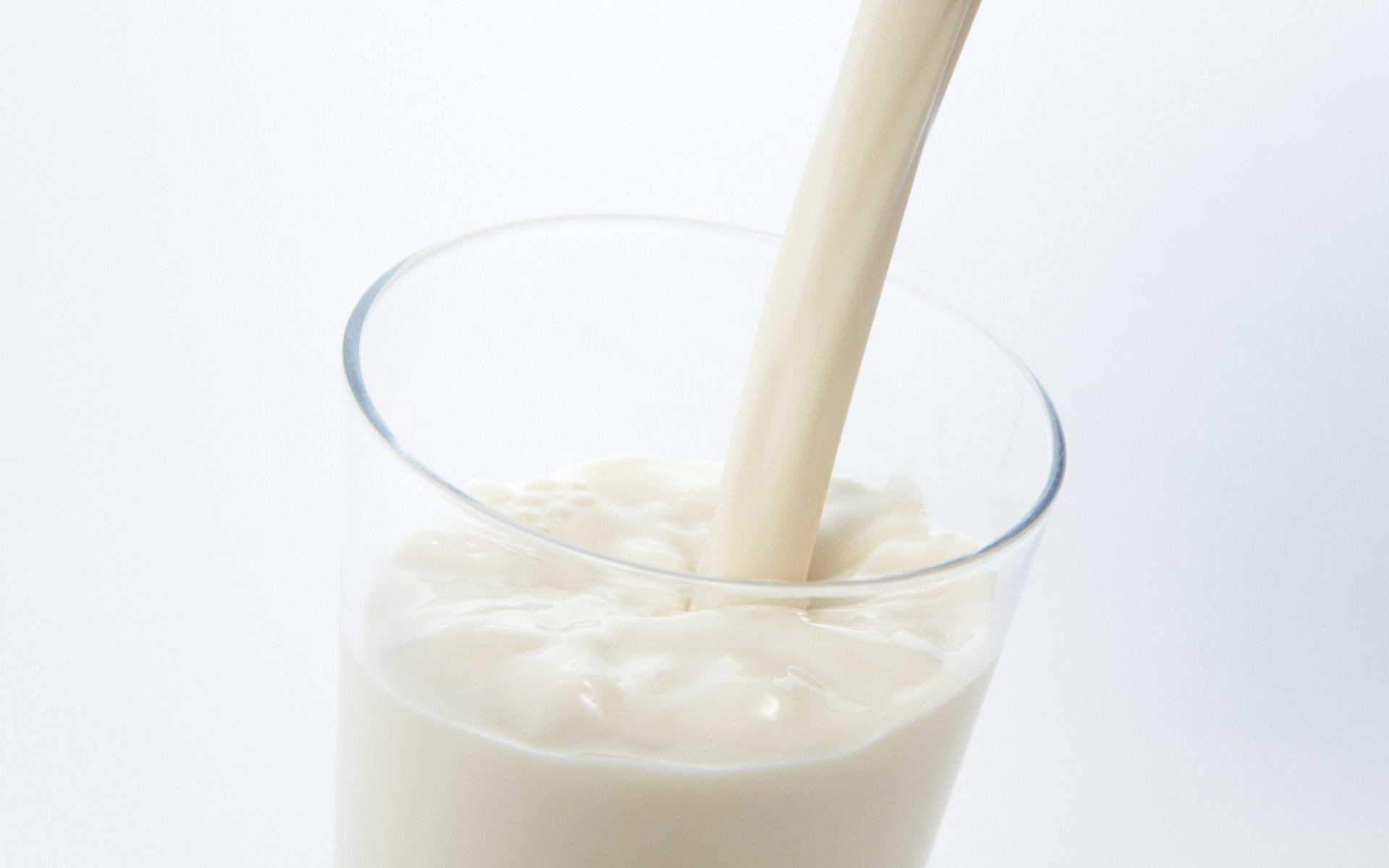 Milk: Refrigerated to prolong its freshness and prevent spoilage. 1920x1200 HD Background.