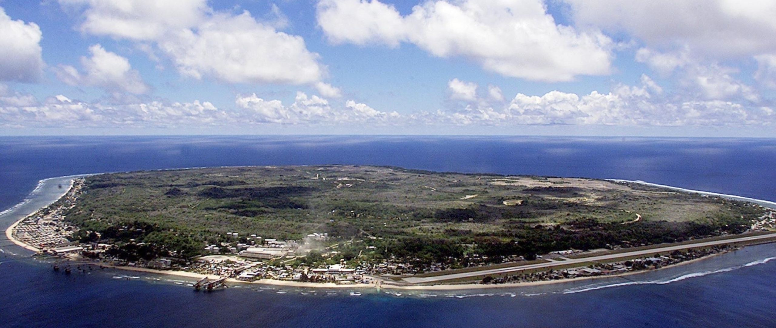 Nauru: The third-smallest country in the world behind Vatican City and Monaco. 2560x1090 Dual Screen Background.