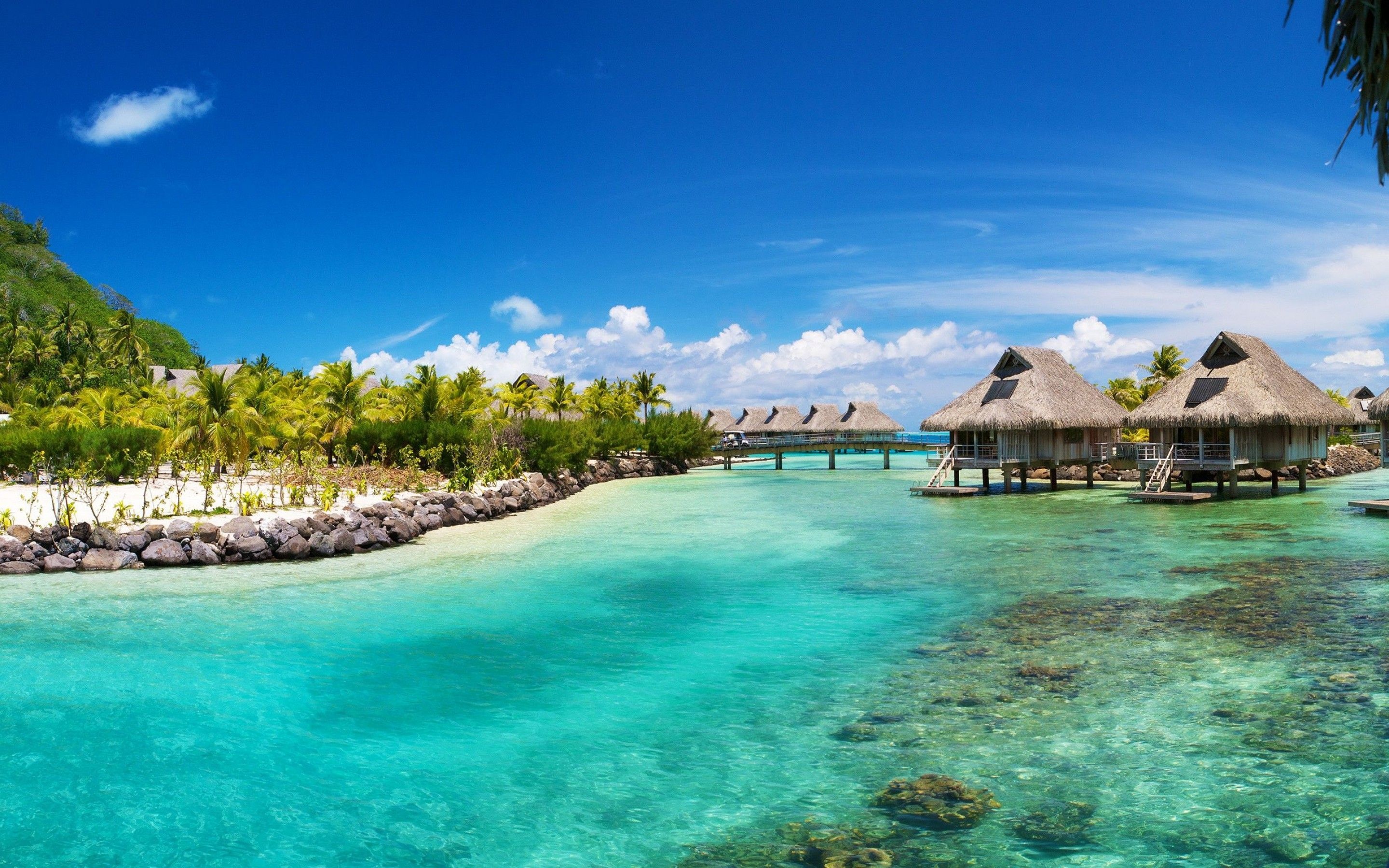 Bora Bora: A tropical island in French Polynesia, located in the middle of the Pacific Ocean. 2880x1800 HD Background.