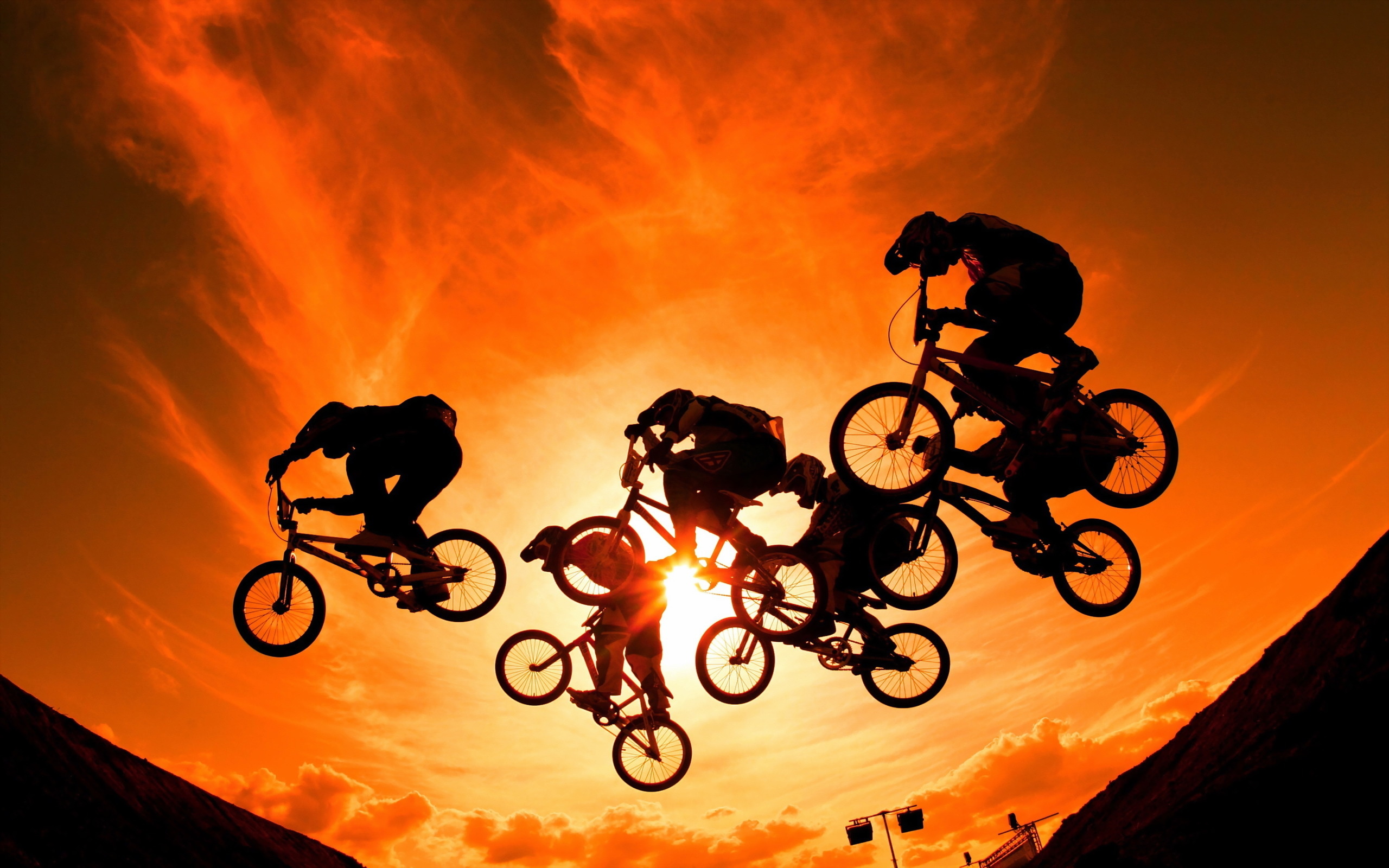 Cycling (Cycle Sport): Sport Bicycle Jumpers during Red Bull District Ride, Nuremberg, Germany. 2560x1600 HD Background.