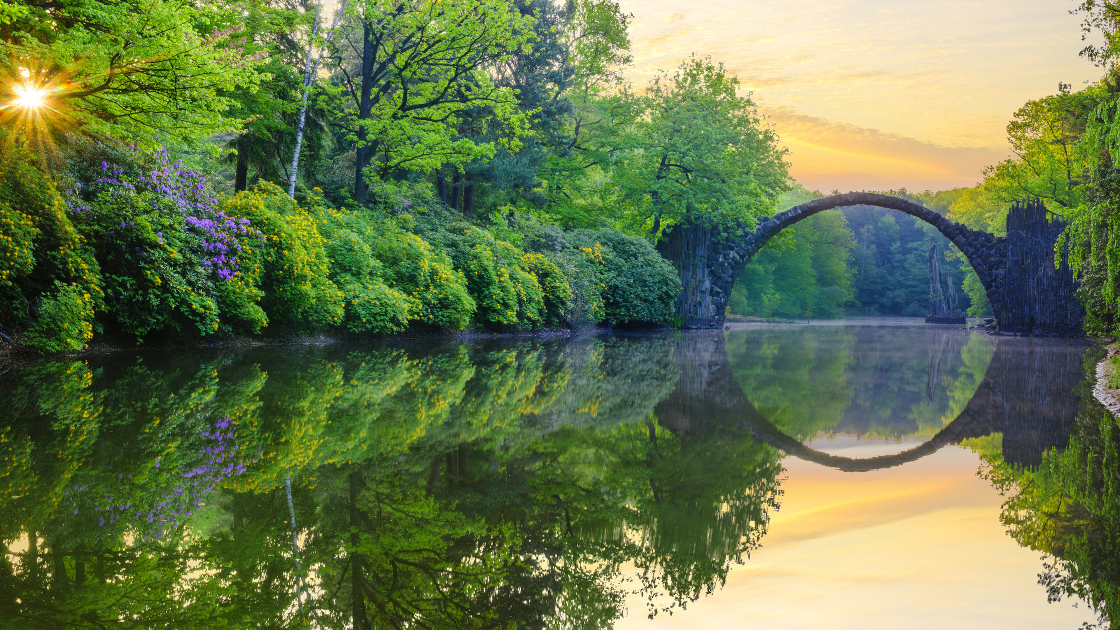 Bridge: Rakotzbrucke Devil's Span in Gablenz, Germany, Reflection forms a perfect circle. 3840x2160 4K Background.