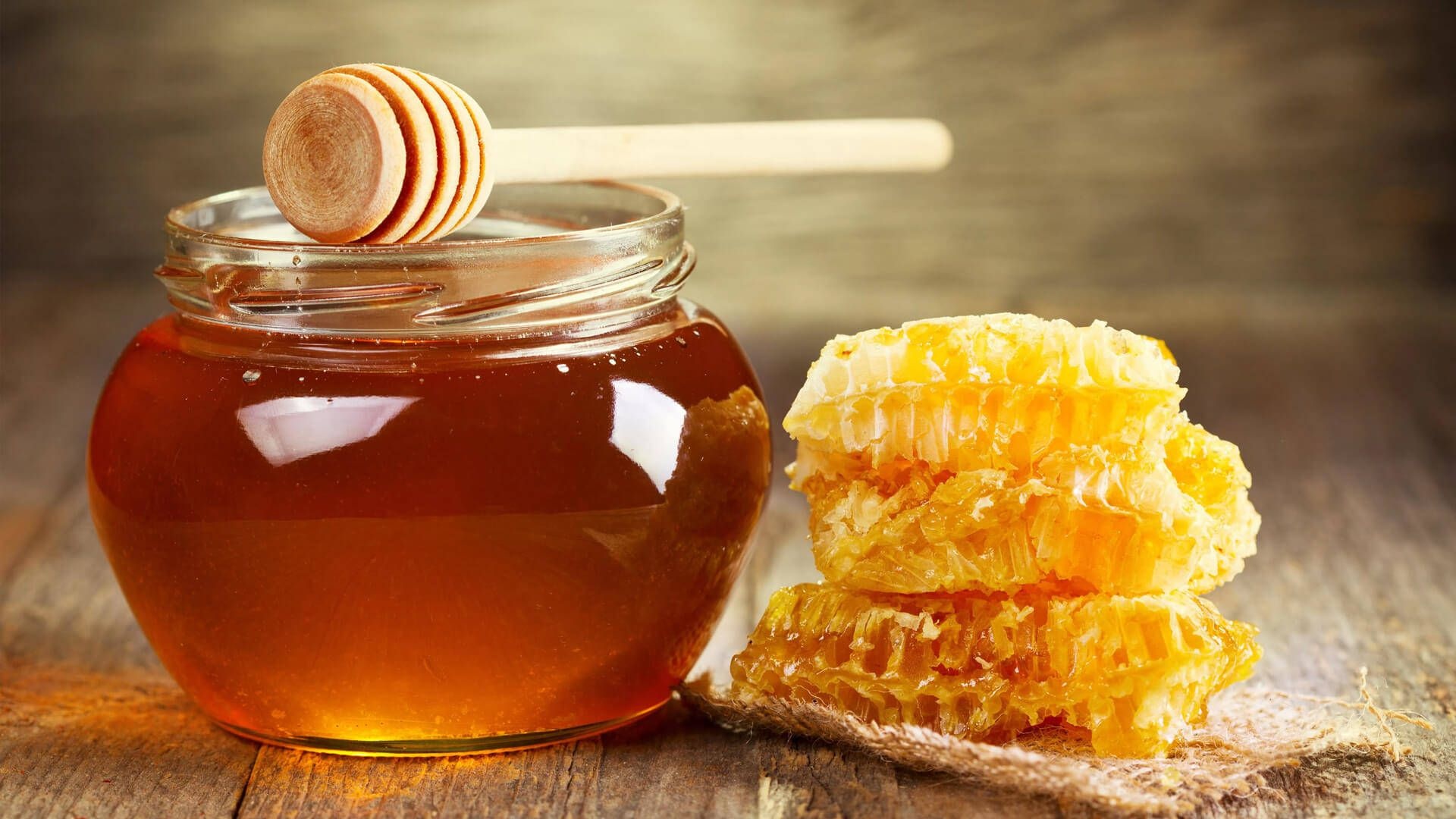 Honey: Stored in the beehive or nest in a honeycomb. 1920x1080 Full HD Wallpaper.