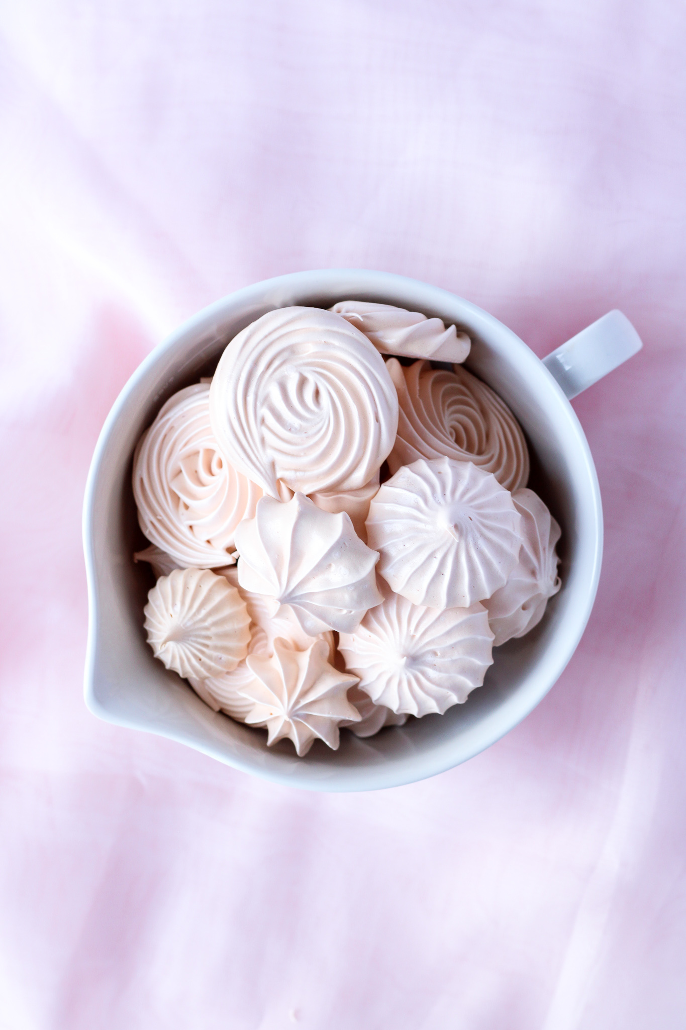 Meringue: Eaten as small “kisses” or as cases and toppings for fruits, ice cream, puddings, and the like. 1370x2050 HD Background.
