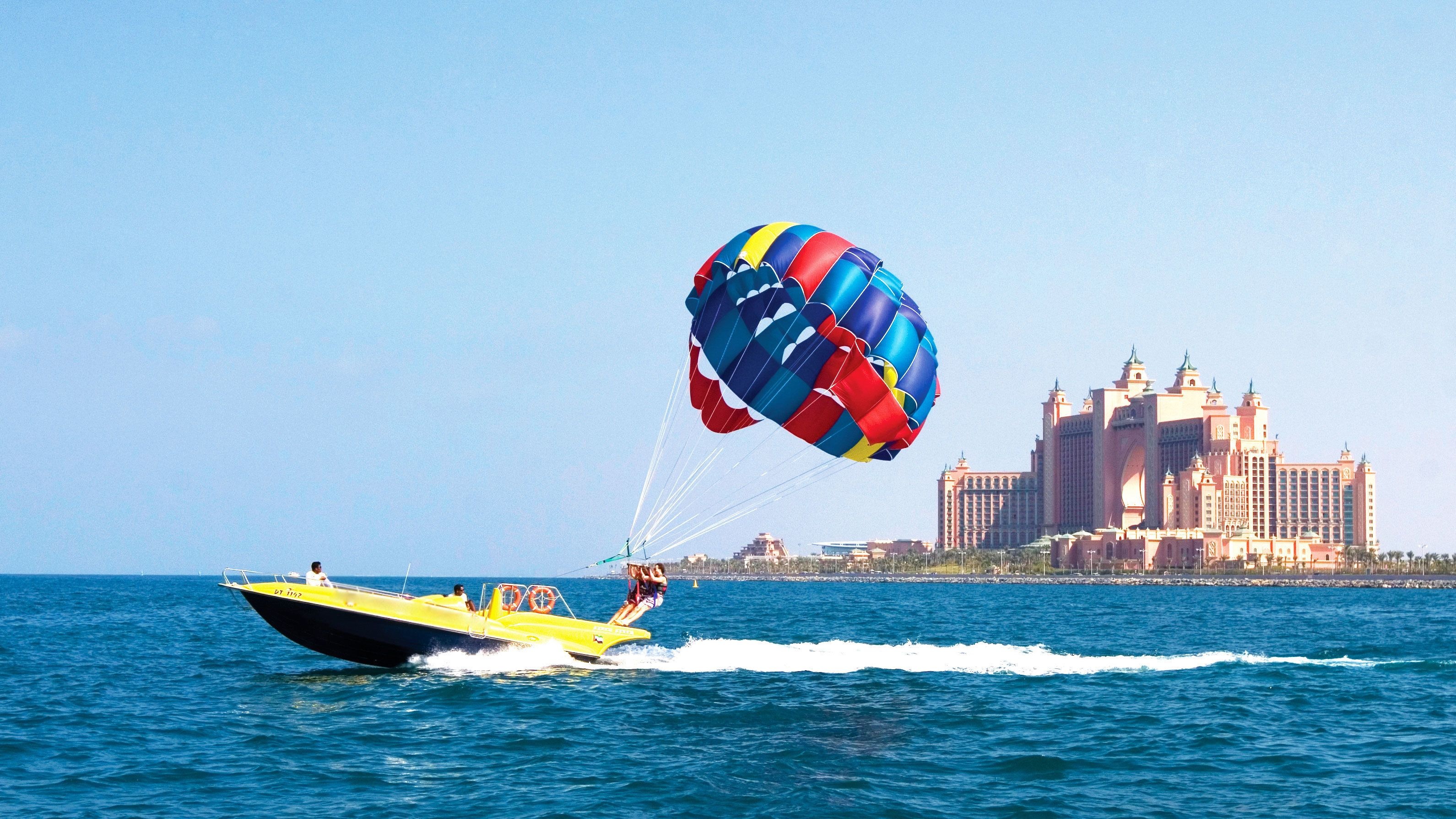 Parasailing: A parasail wing, A harness, A parascender, Behind the boat, Parachute. 3190x1790 HD Background.