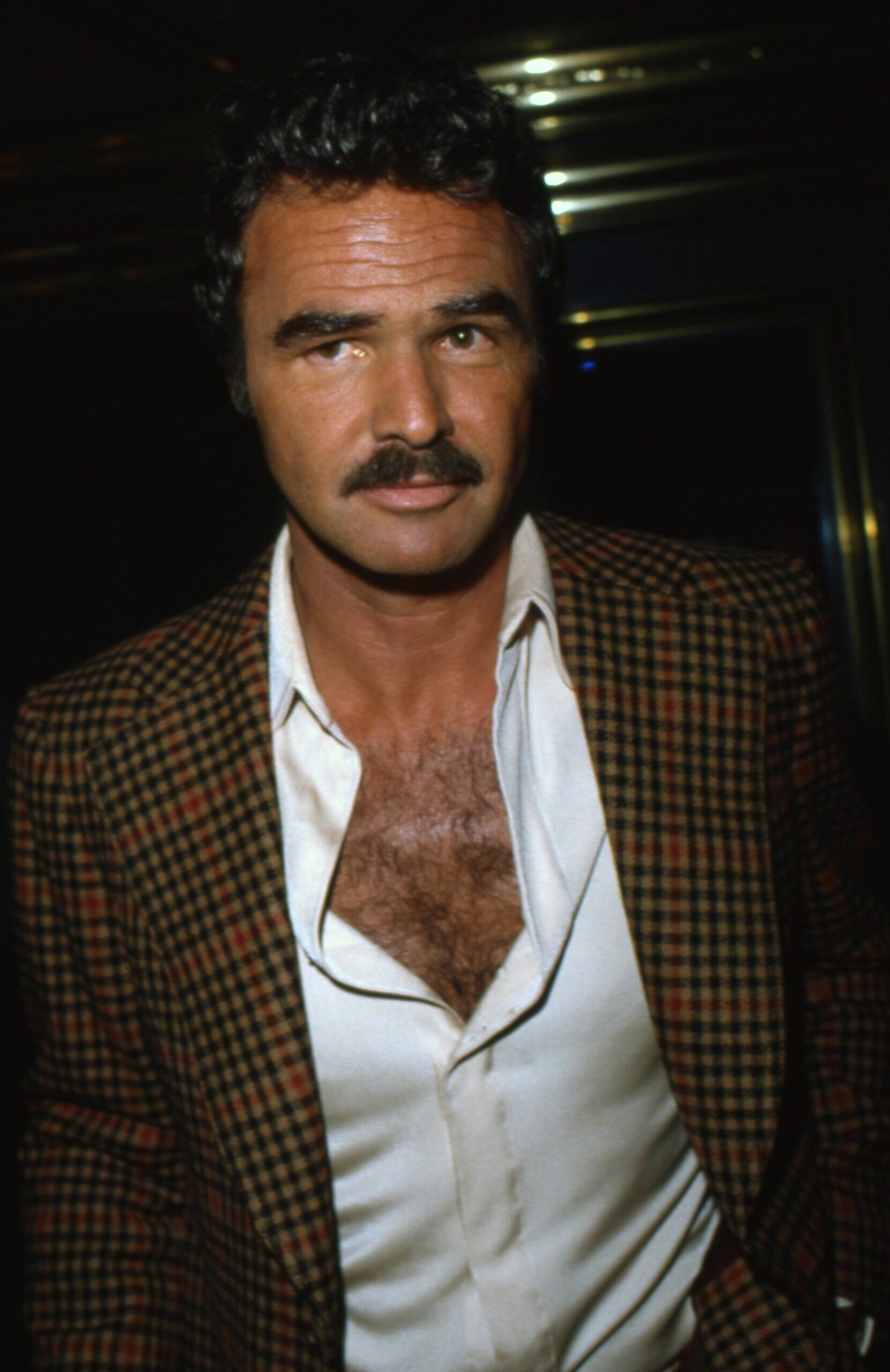 Burt Reynolds: A male sex symbol and icon of American masculinity, An actor, An amiable king of machismo, hairy chests. 1660x2560 HD Wallpaper.