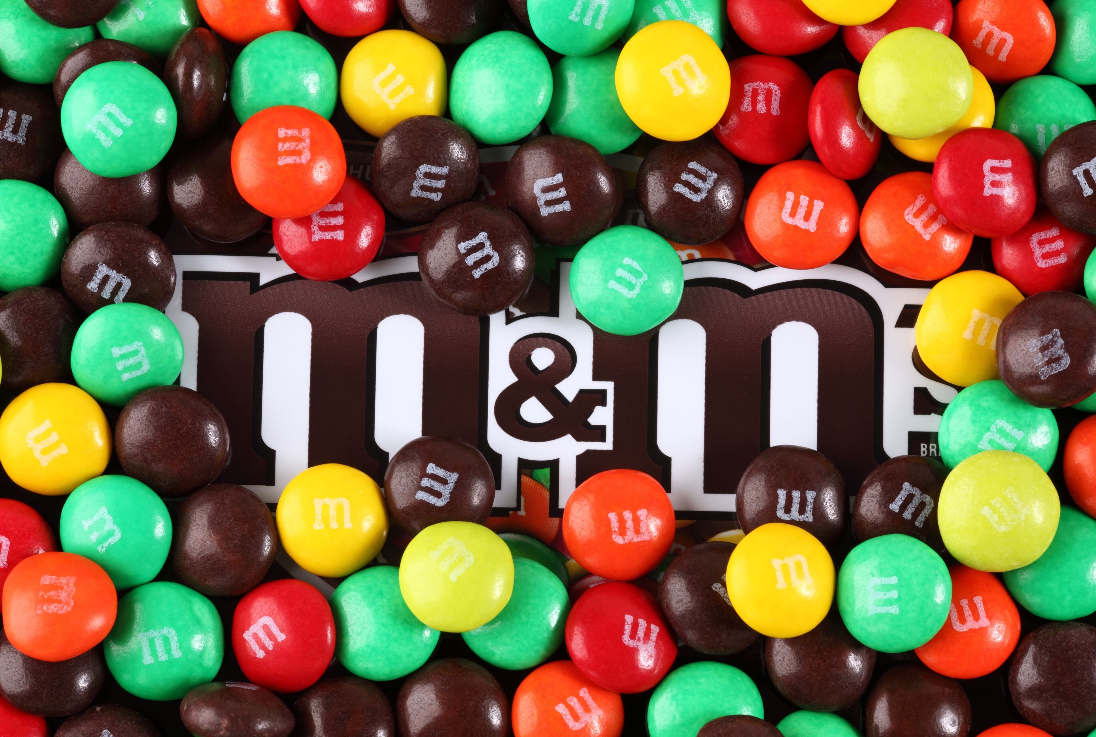 M&M’s: Multi-colored button-shaped chocolates. 3830x2580 4K Background.