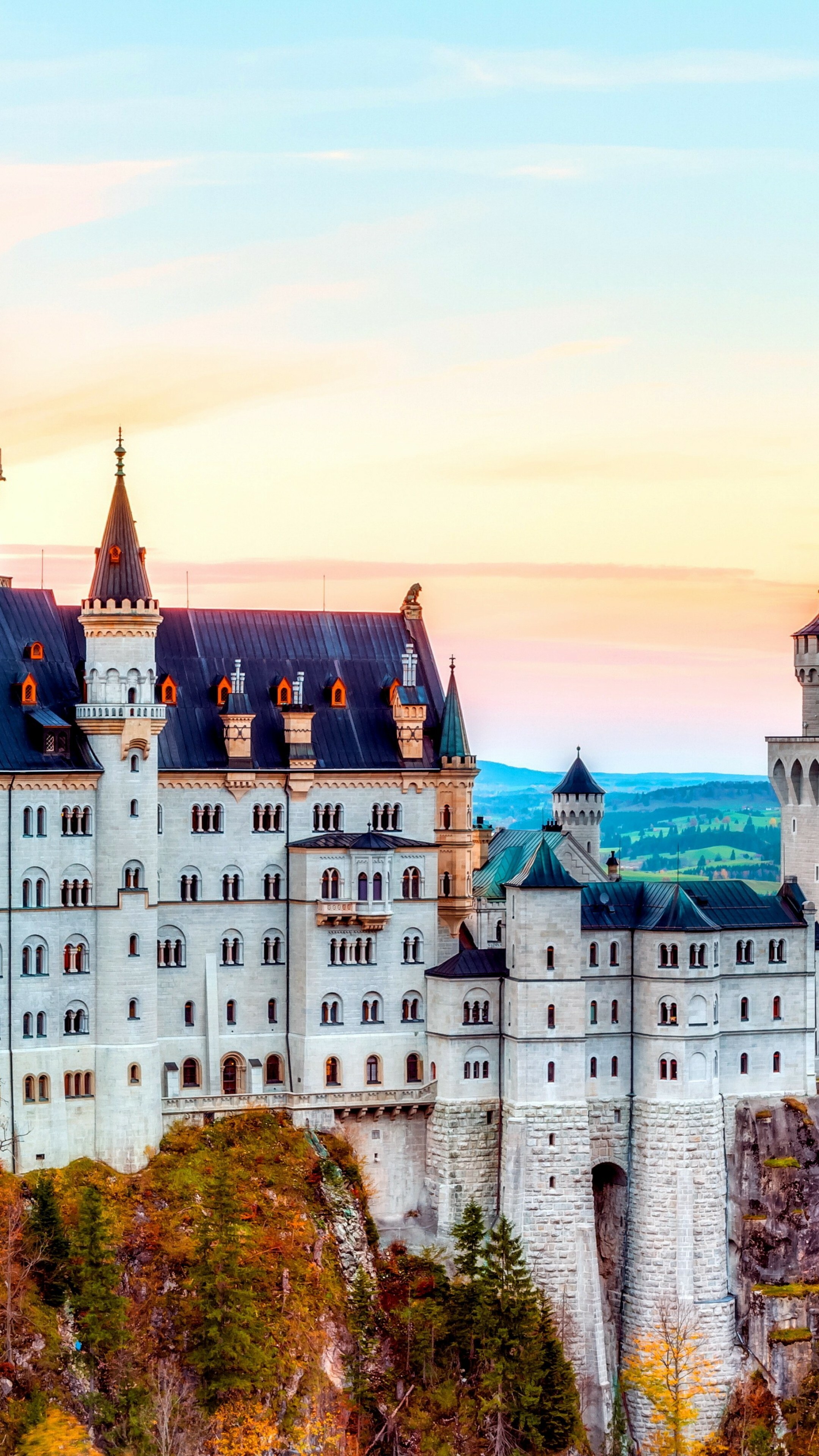 Neuschwanstein Castle: One of the most popular tourist destinations in Europe, Bavaria, Germany. 2160x3840 4K Background.