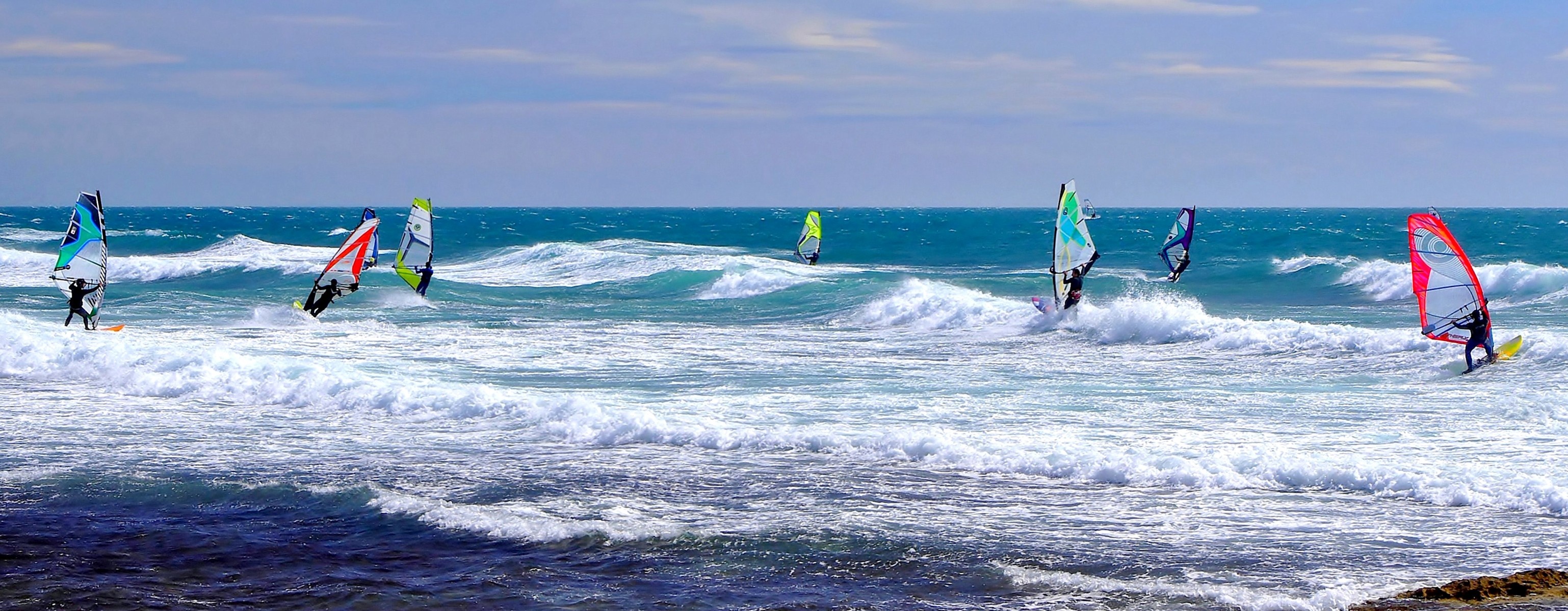 Windsurfing: Sailing and Surfing, Olympic Summer Sport, Windfoiling, Wingfoiling and Kiteboarding. 3080x1200 Dual Screen Background.