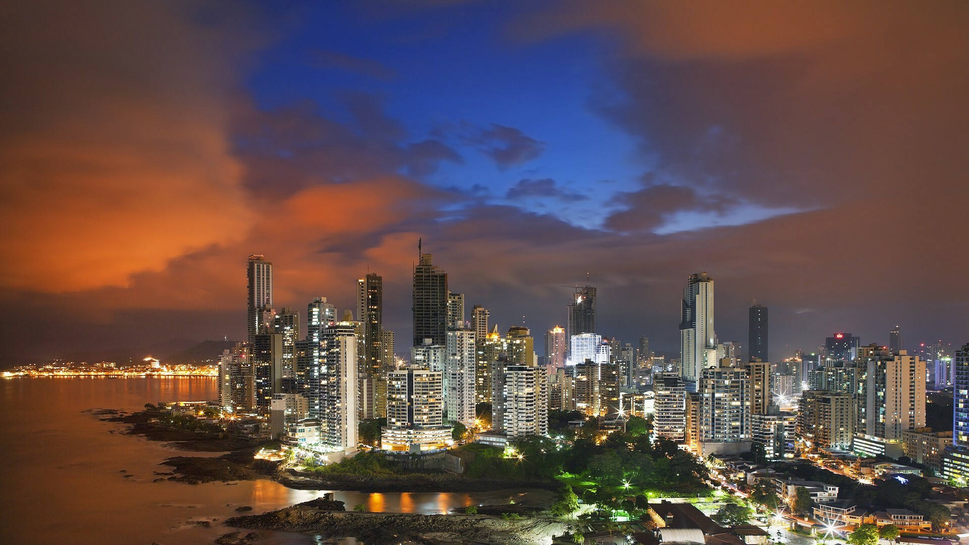 Panama: Located between North and South America with coasts in the Caribbean Sea and Pacific Ocean, Night skyline. 1920x1080 Full HD Background.