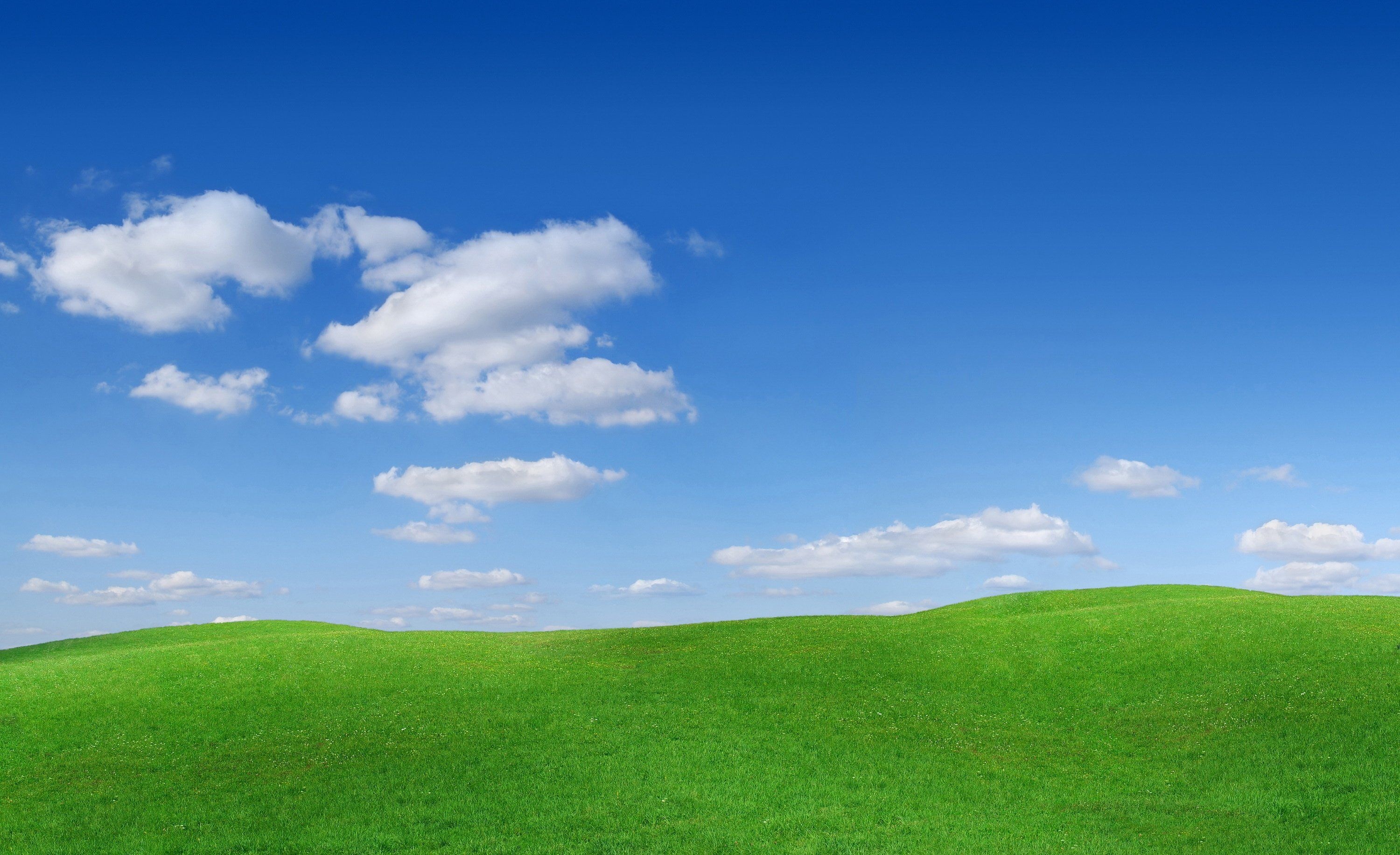 Grass and Sky: Hill, Open space, Out-of-doors, Natural element, An extensive area of land. 3000x1840 HD Wallpaper.