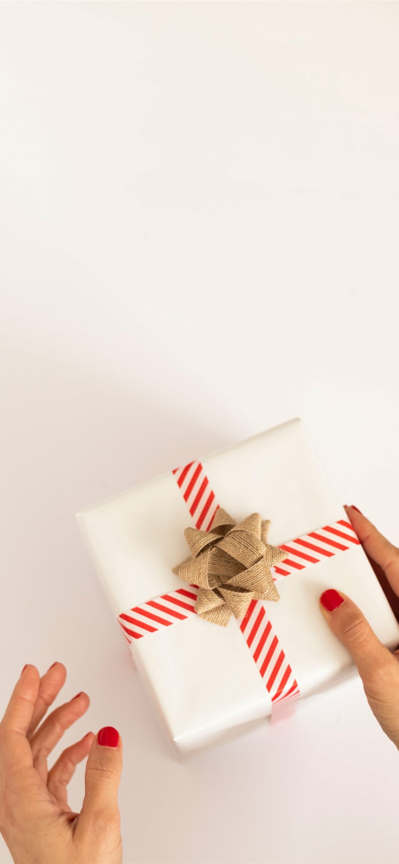 Person holding, White and red gift box, iPhone wallpapers, 1290x2780 HD Phone