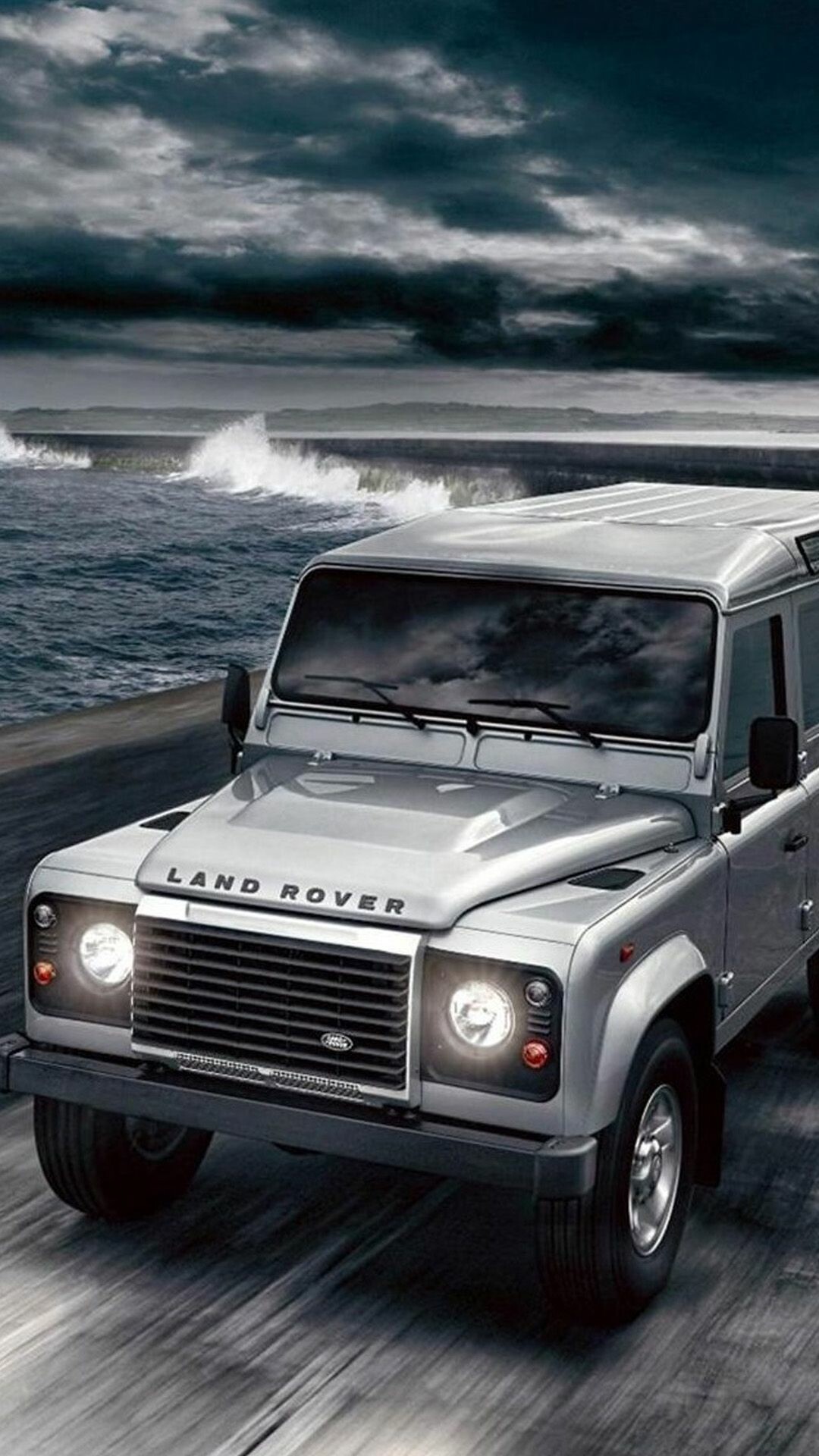 Land Rover: The Ninety and One-Ten range of models was given the generic name of Defender in 1990. 1080x1920 Full HD Background.