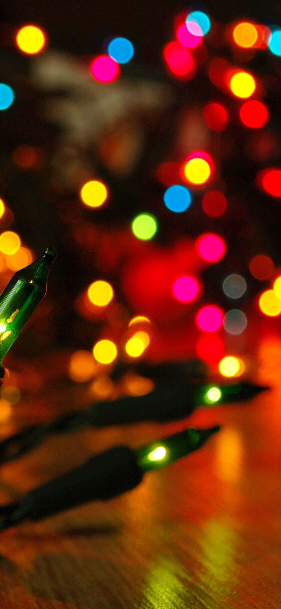 Christmas Lights: The illumination made specifically for holidays season. 1130x2440 HD Background.
