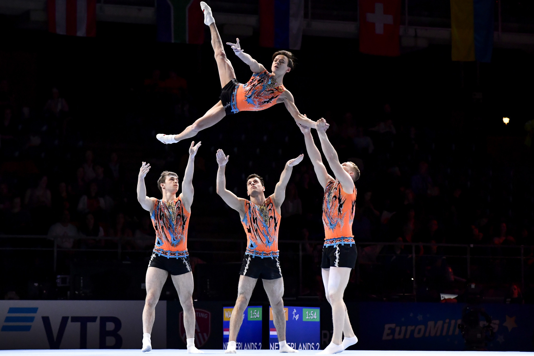 Acrobatic Gymnastics: Russia federation Men's Group Viktor Grechukhin, Vadim Nabiev, Aleksandr Pchelnikov, Andrei Shkvarok. 2050x1370 HD Background.