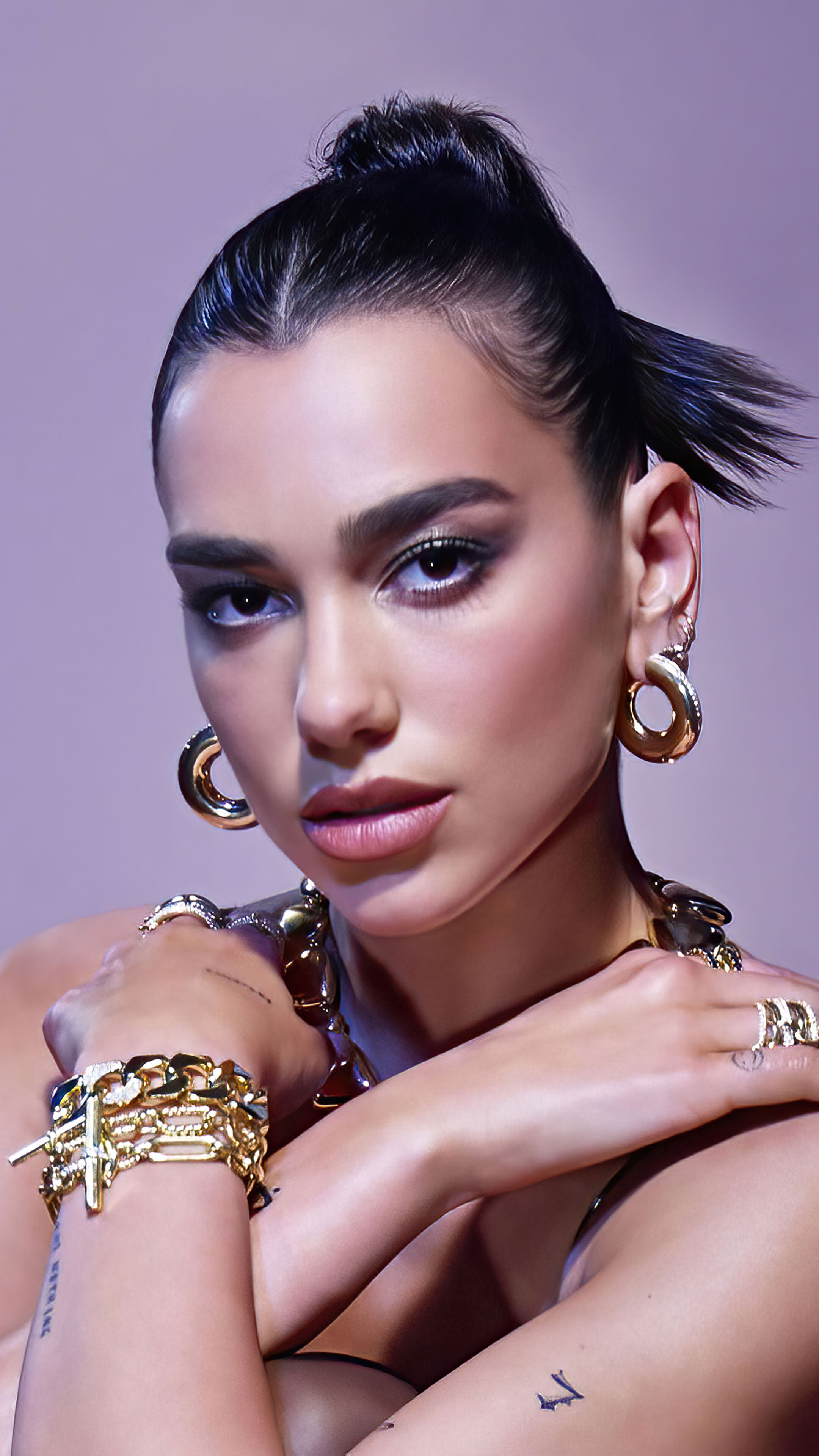 Dua Lipa: Signed with Warner Bros. Records in 2014. 2160x3840 4K Background.