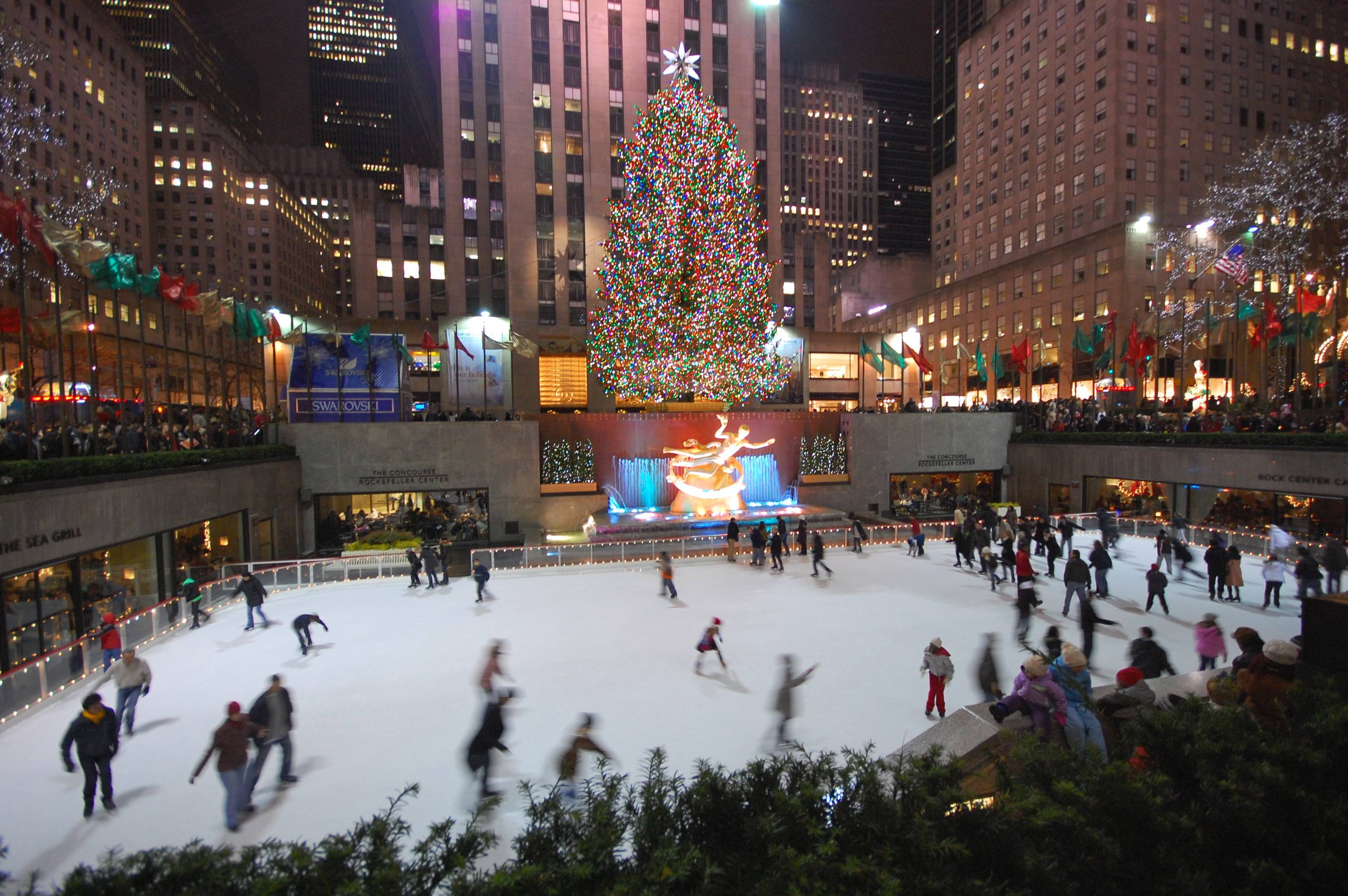 New York Christmas: Rockefeller Center ice rink, Iconic attractions. 3010x2000 HD Background.