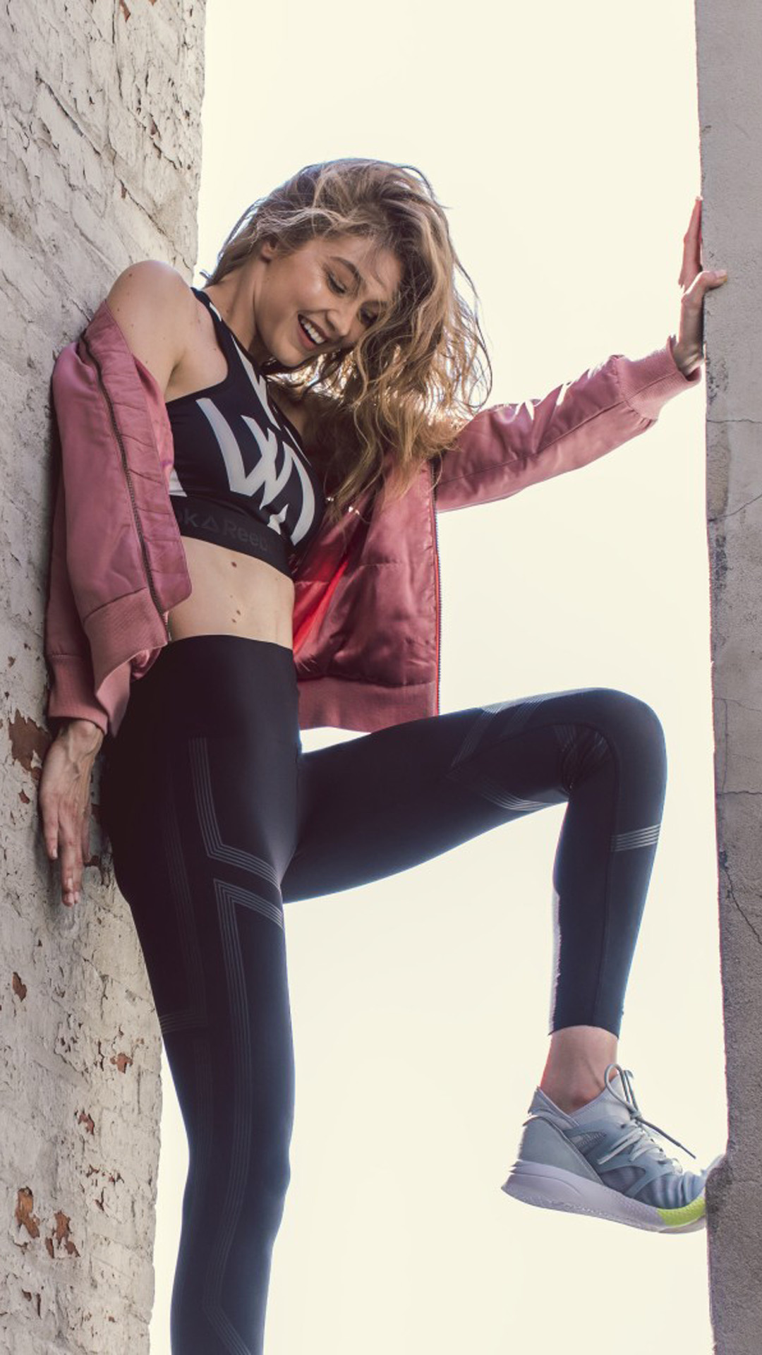 Reebok: Gigi Hadid, A model-sportswear collaboration, The face of sneaker and activewear brand. 1080x1920 Full HD Wallpaper.