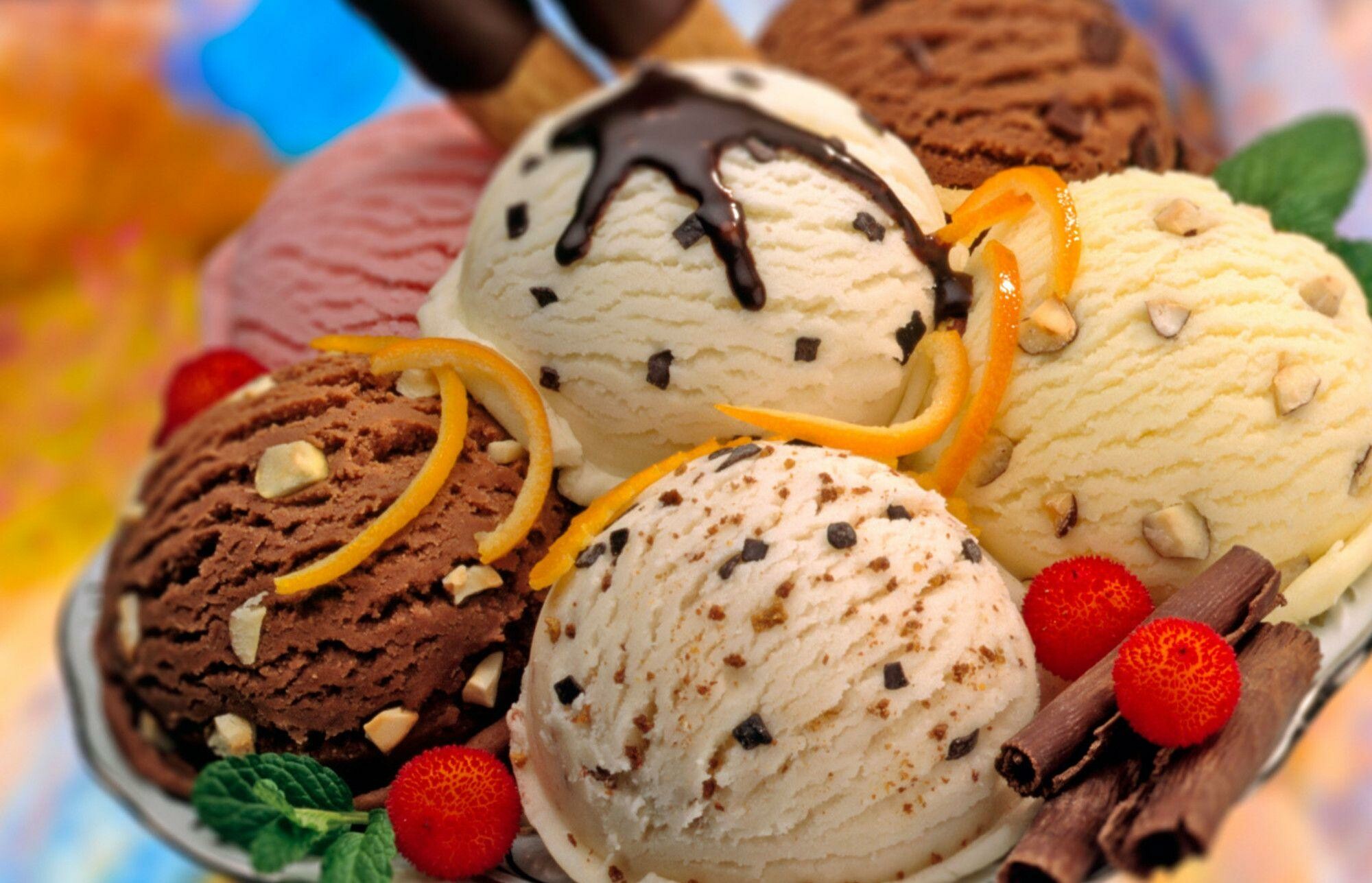 Ice Cream: A frozen dairy dessert obtained by freezing the ice cream mix with continuous agitation. 2000x1290 HD Background.