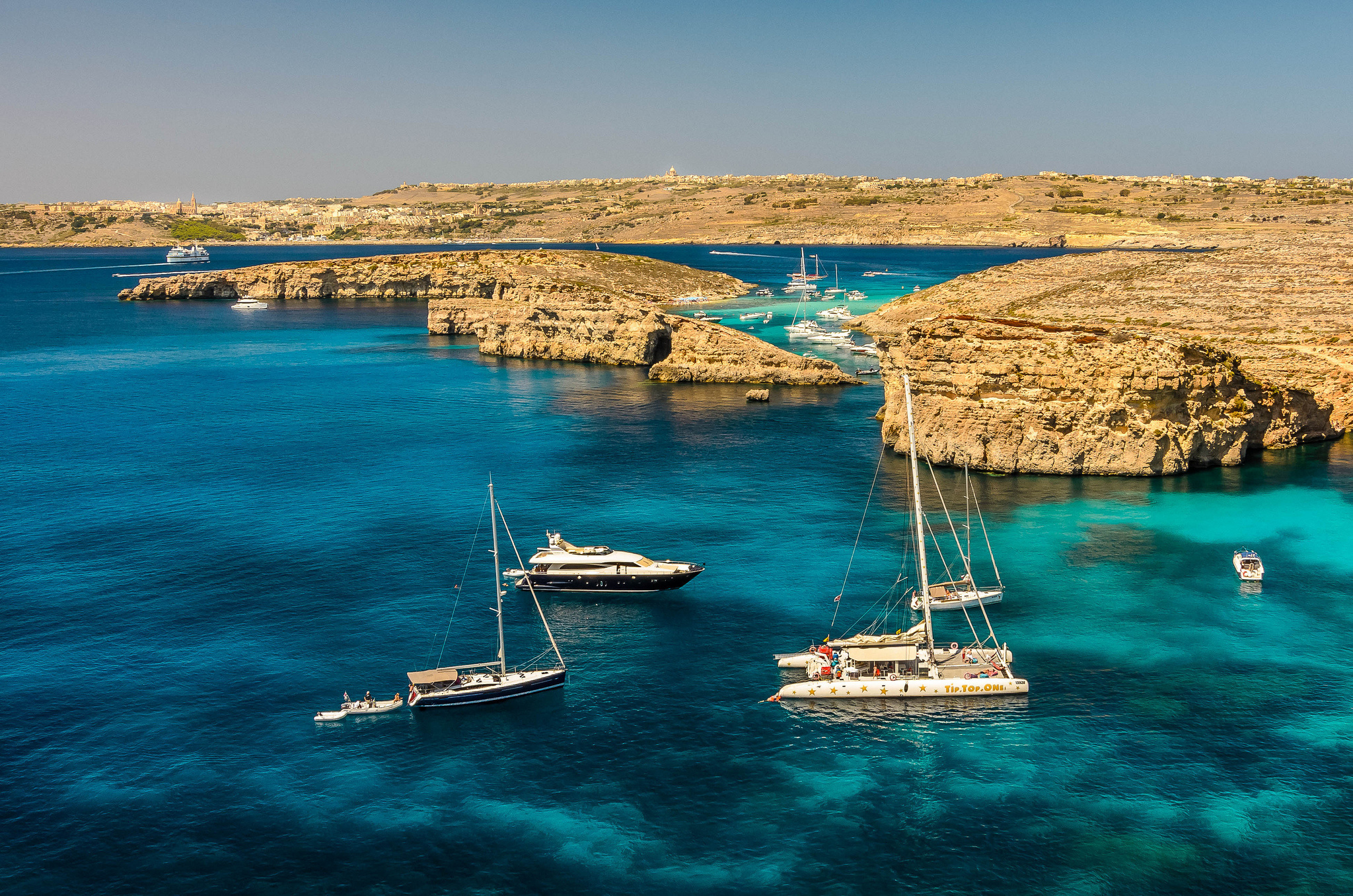 Catamaran: A sail or engine-powered boat with a double hull, Sea, Malta. 2050x1360 HD Wallpaper.