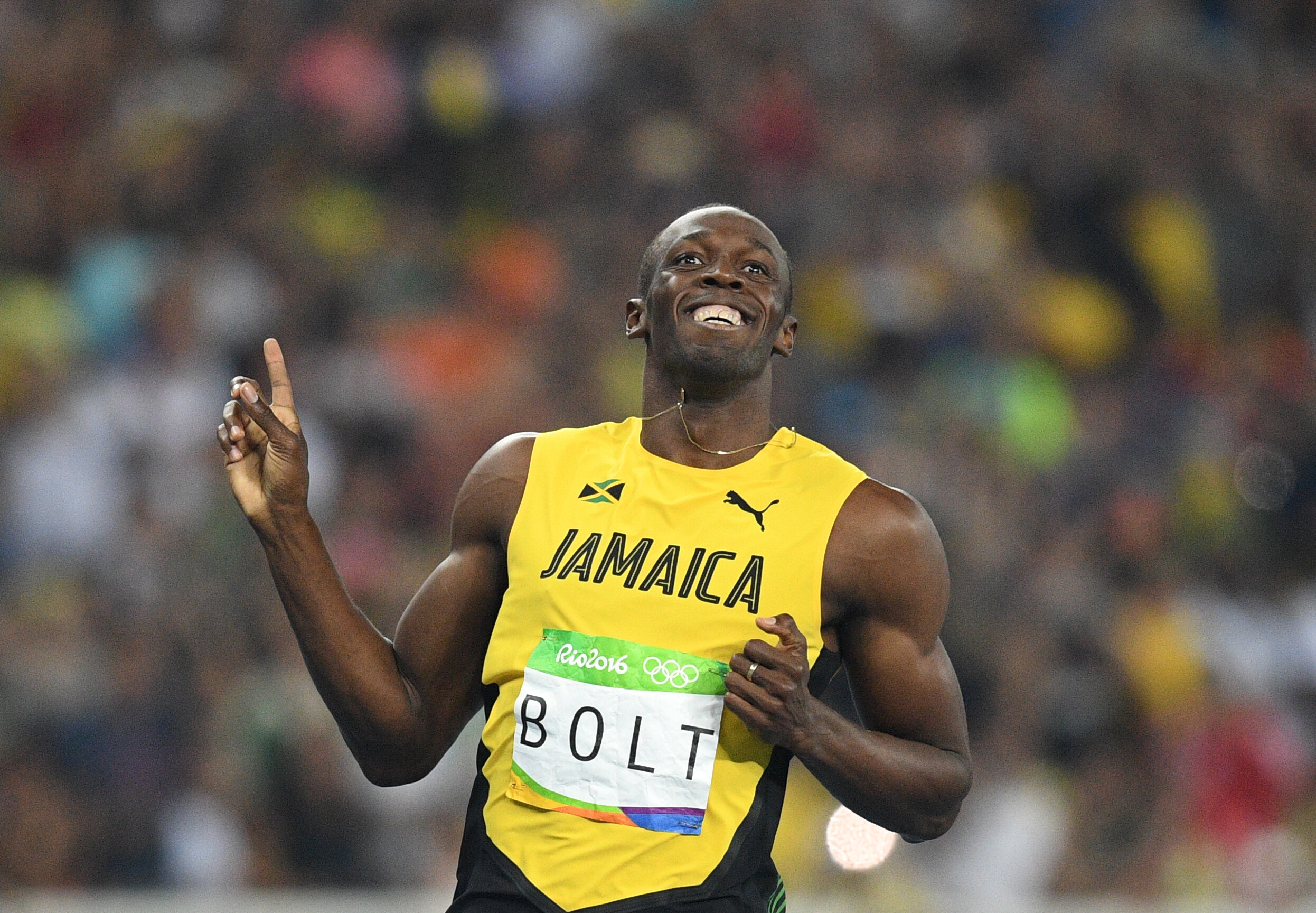 Usain Bolt: He gained worldwide fame for his double sprint victory in world record times at the 2008 Beijing Olympics. 2500x1730 HD Background.