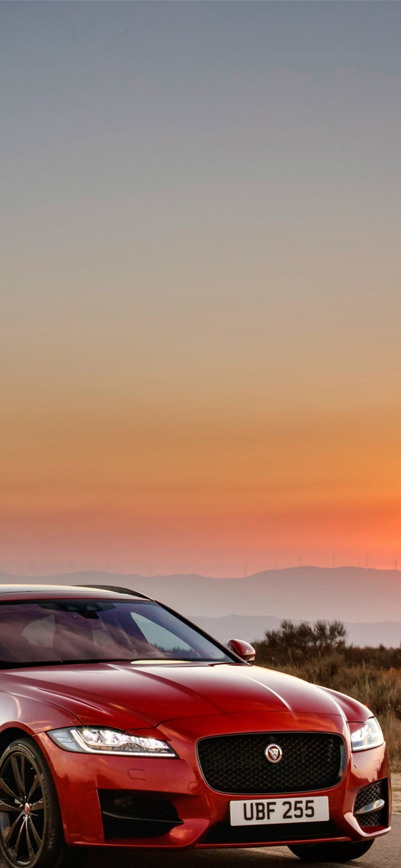 Jaguar Cars: A British luxury vehicle company, Cars. 1290x2780 HD Wallpaper.