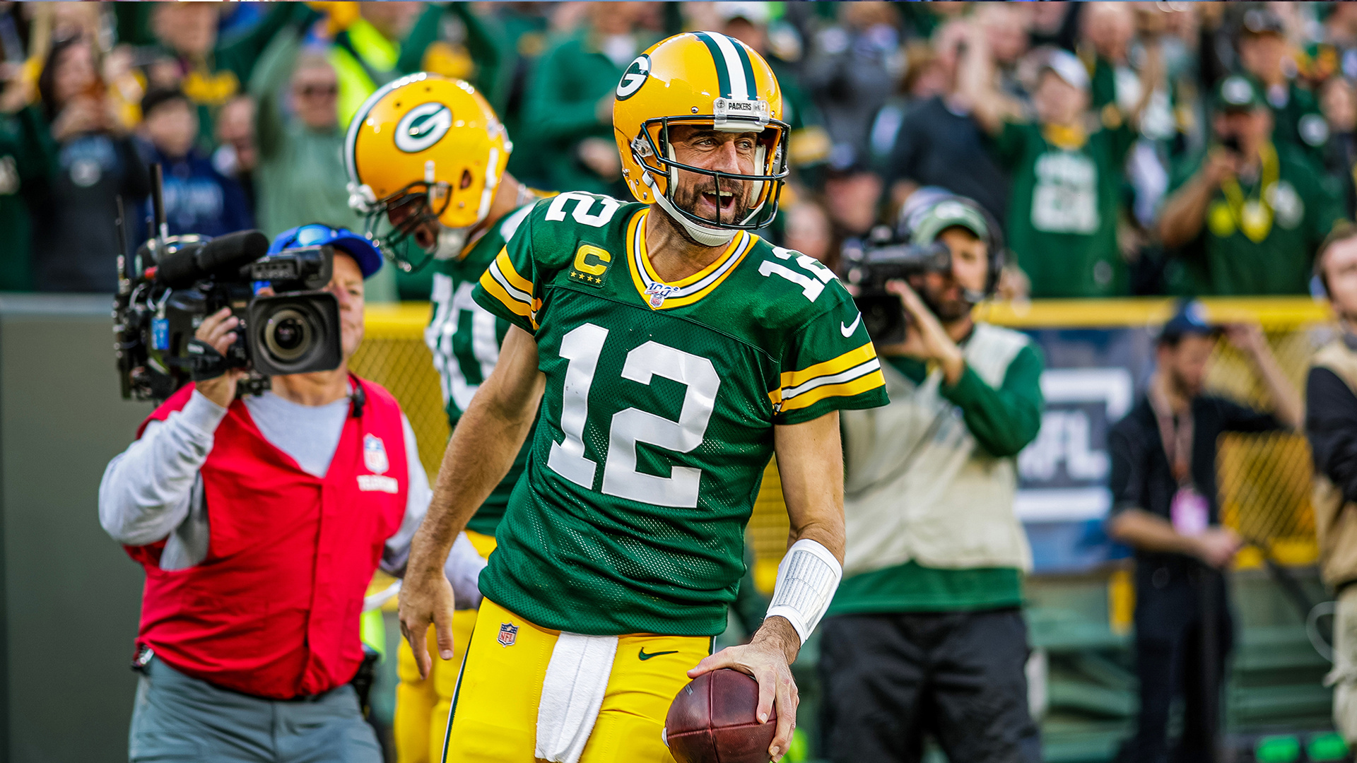 Green Bay Packers: Aaron Rodgers, An American football quarterback, The fifth player to win NFL MVP in consecutive seasons. 1920x1080 Full HD Background.