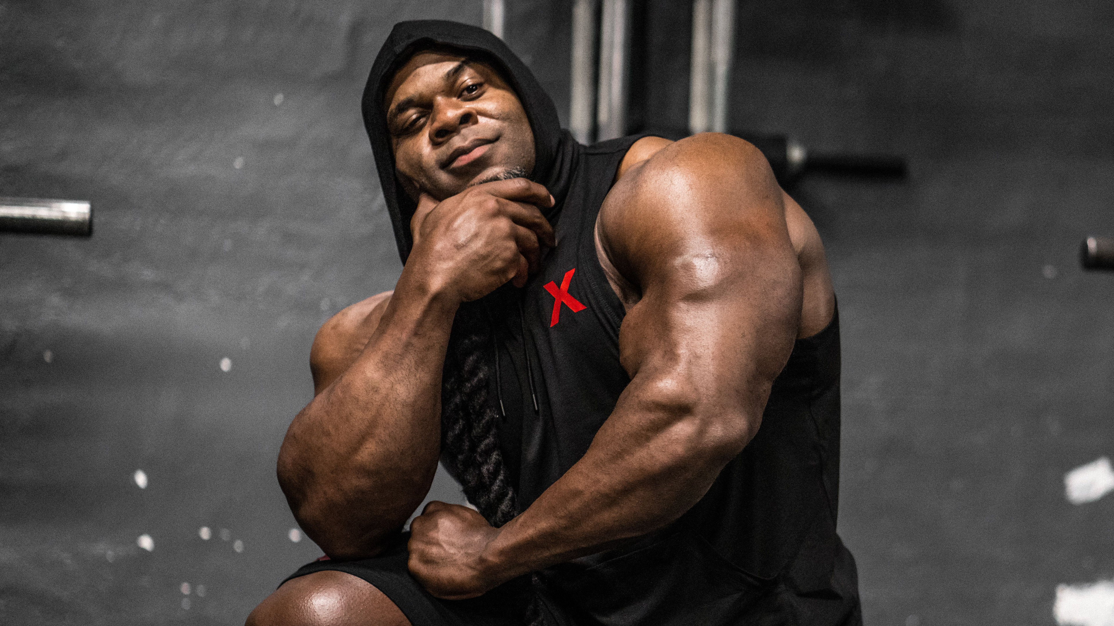 Bodybuilding: Kai Greene, The practice of lifting weights to develop a beautiful body. 3840x2160 4K Background.