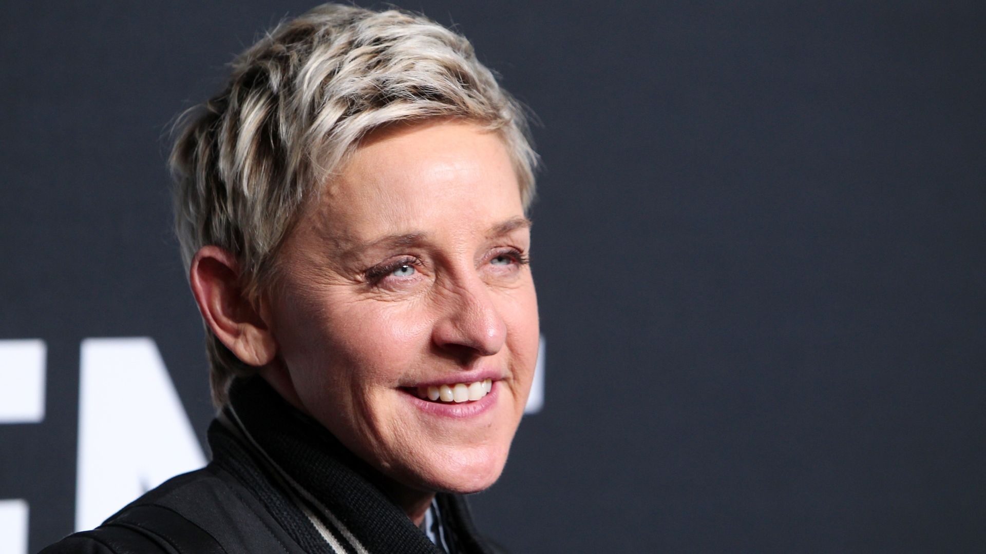 Ellen DeGeneres: A stand-up comedian, actress, multiple Emmy Award-winner, and writer. 1920x1080 Full HD Wallpaper.